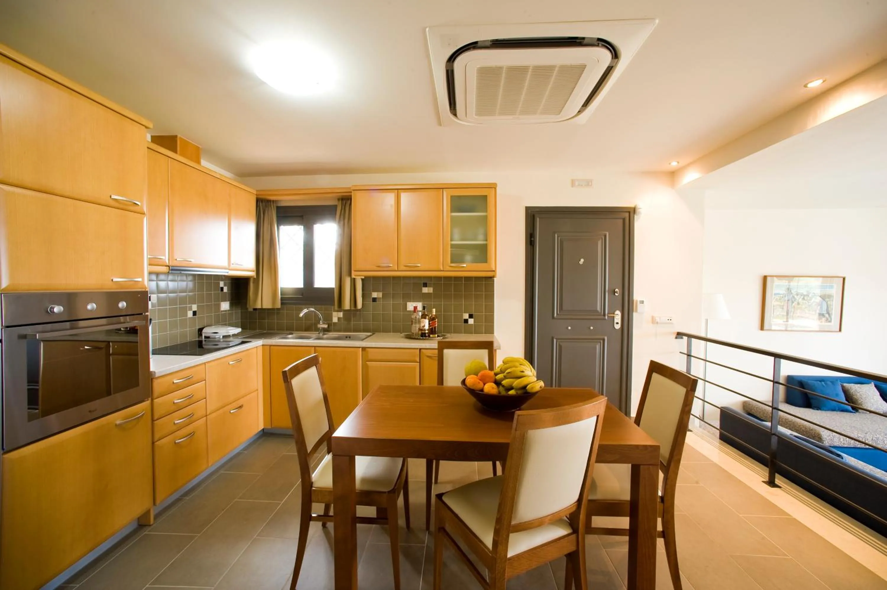 Kitchen or kitchenette in Elounda Olea Villas And Apartments