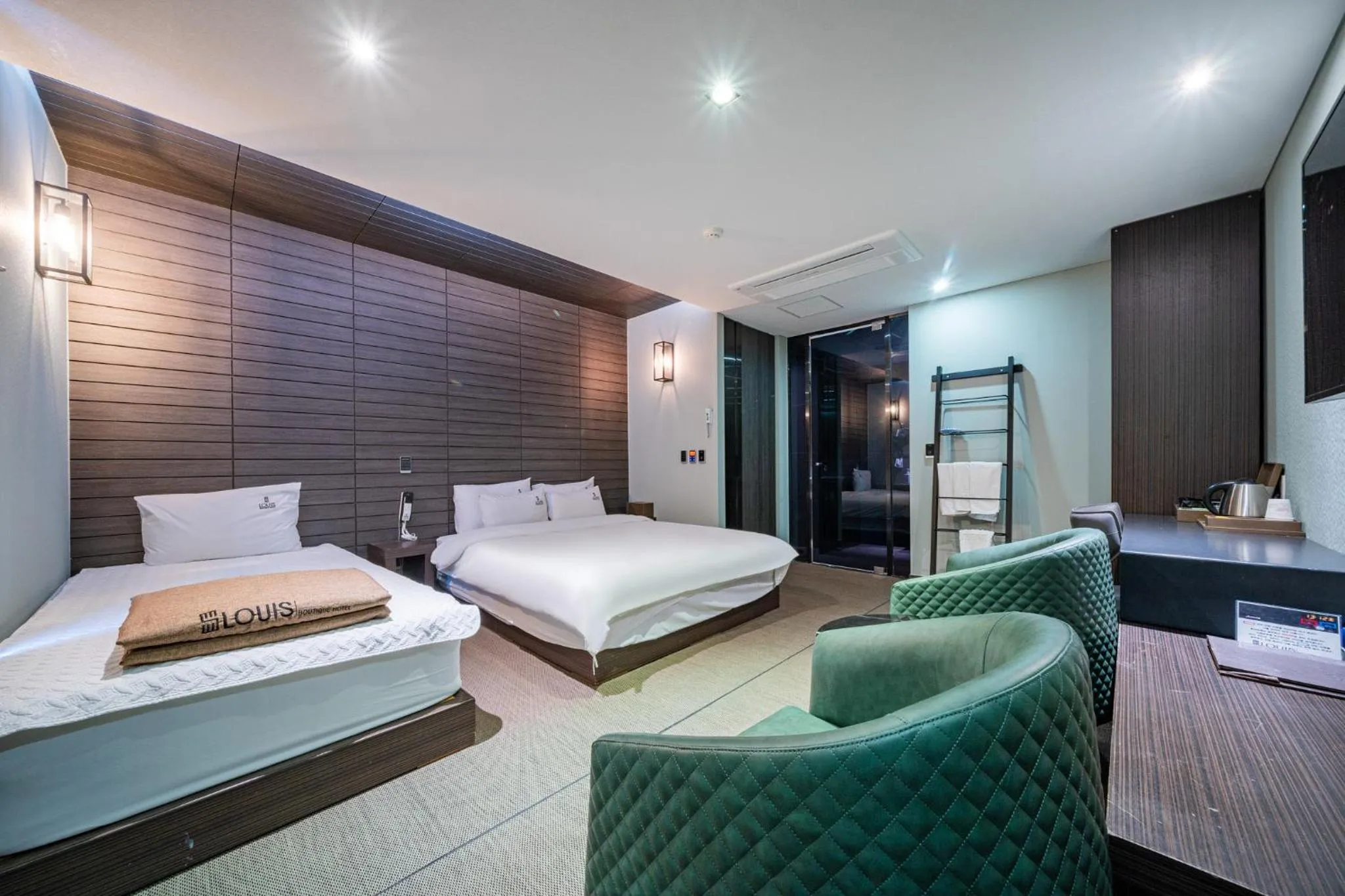 Bed in Louis Boutique Hotel