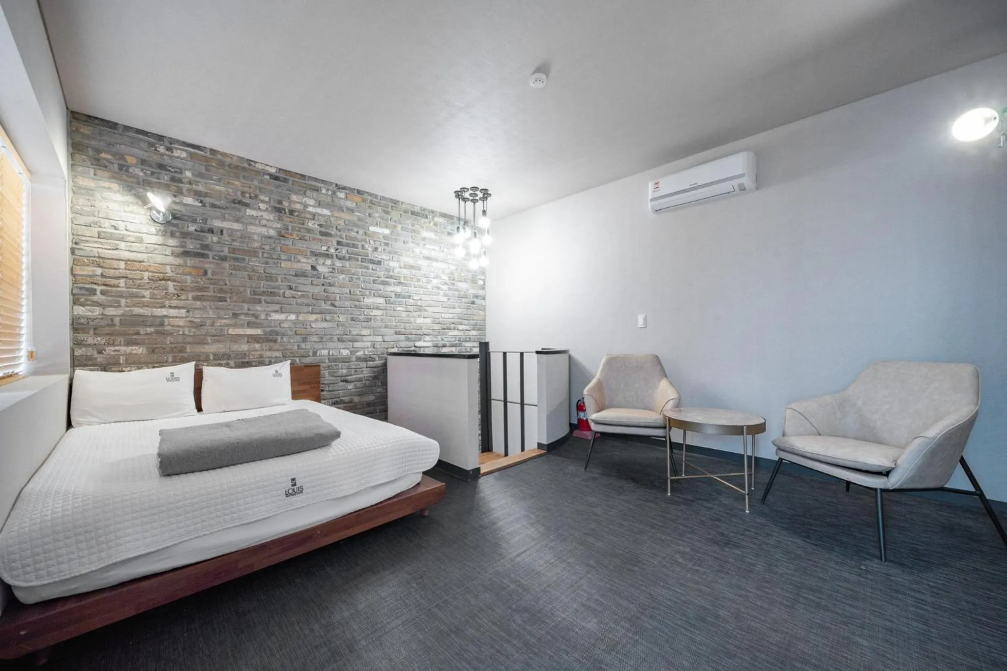 Bed in Louis Boutique Hotel