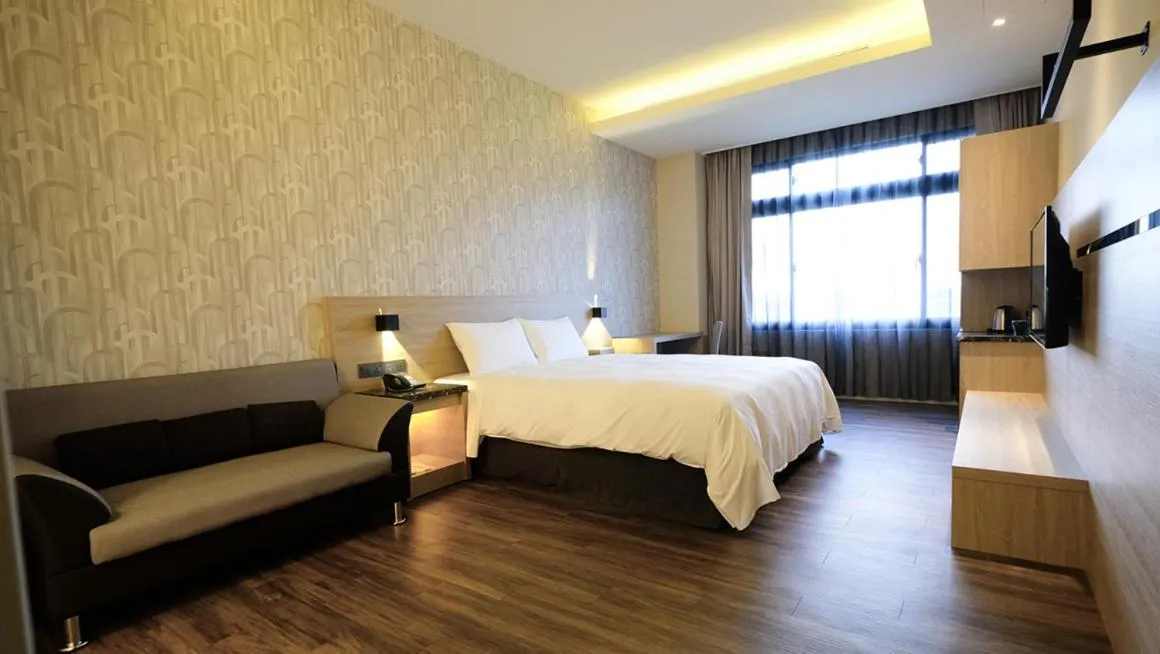 Bed in Yu Chun Hotel