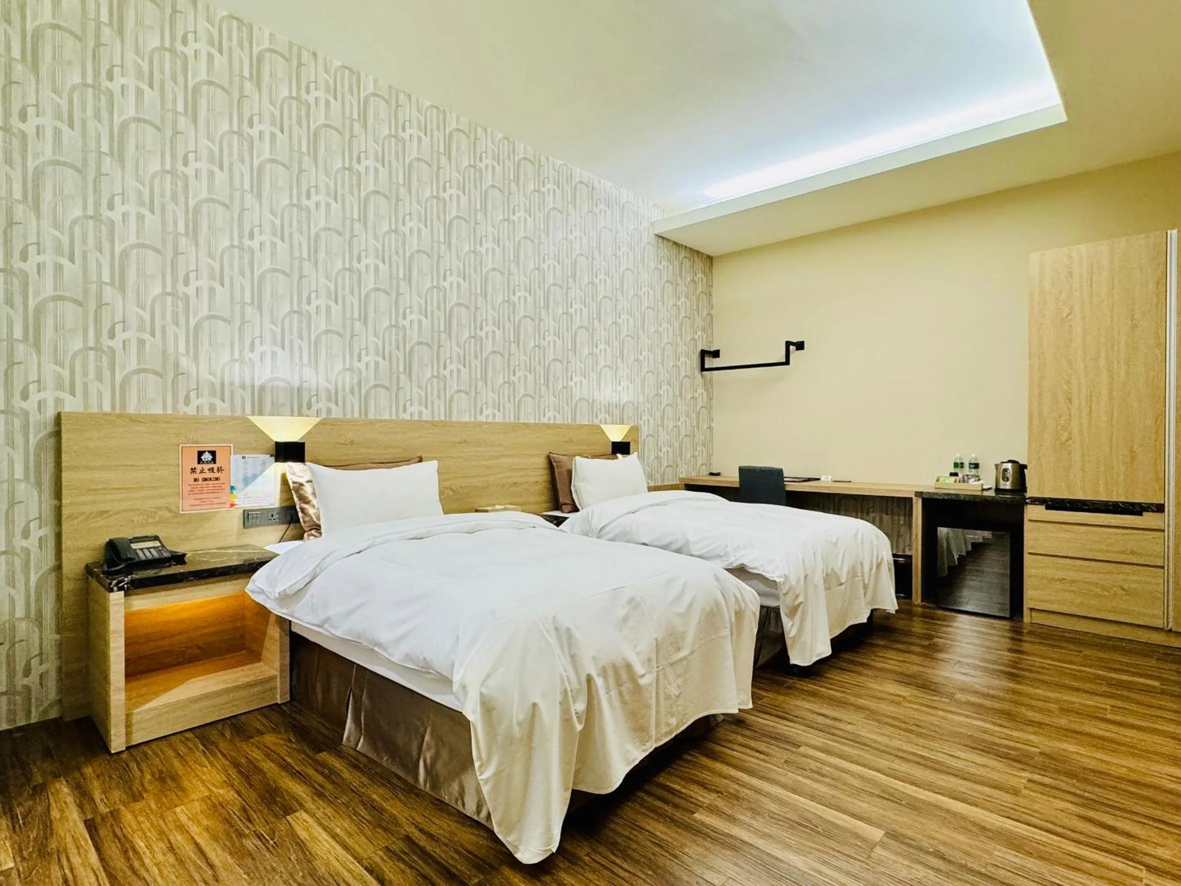 Bed in Yu Chun Hotel