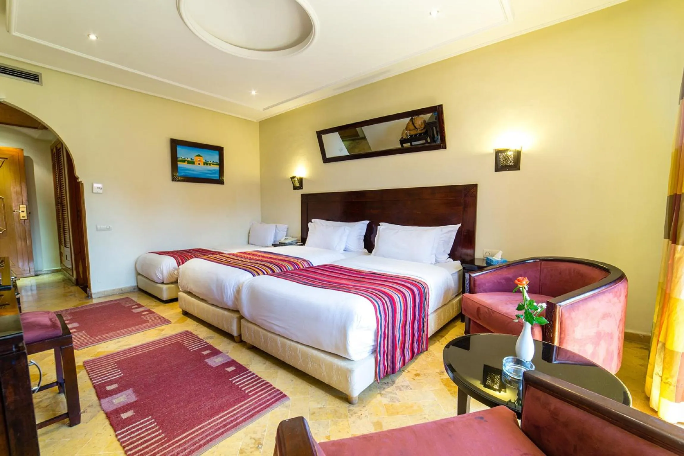 Photo of the whole room in Hotel Les Trois Palmiers