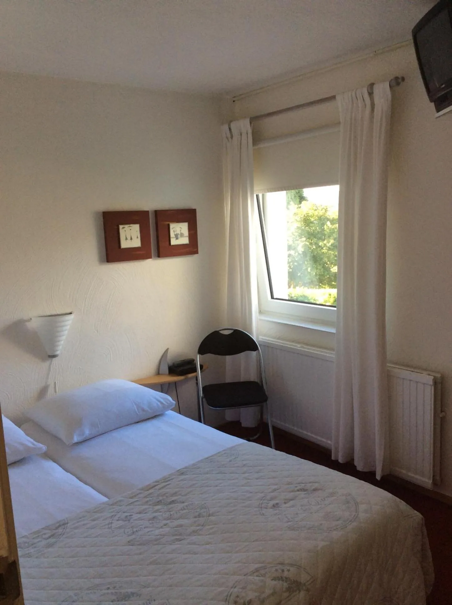 Bed in Hotel Pension Oranje