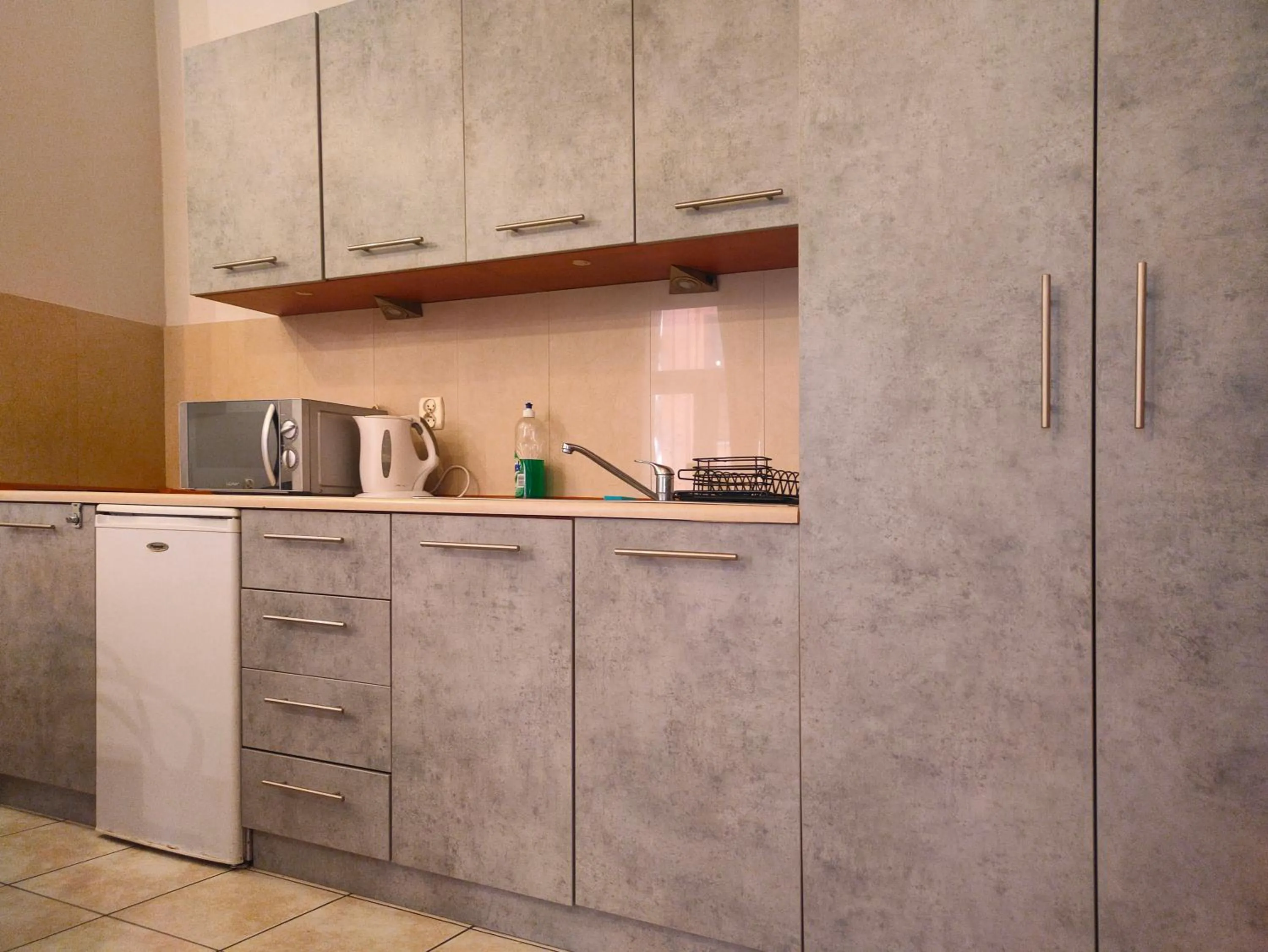 Kitchen or kitchenette in Apartamenty Amber