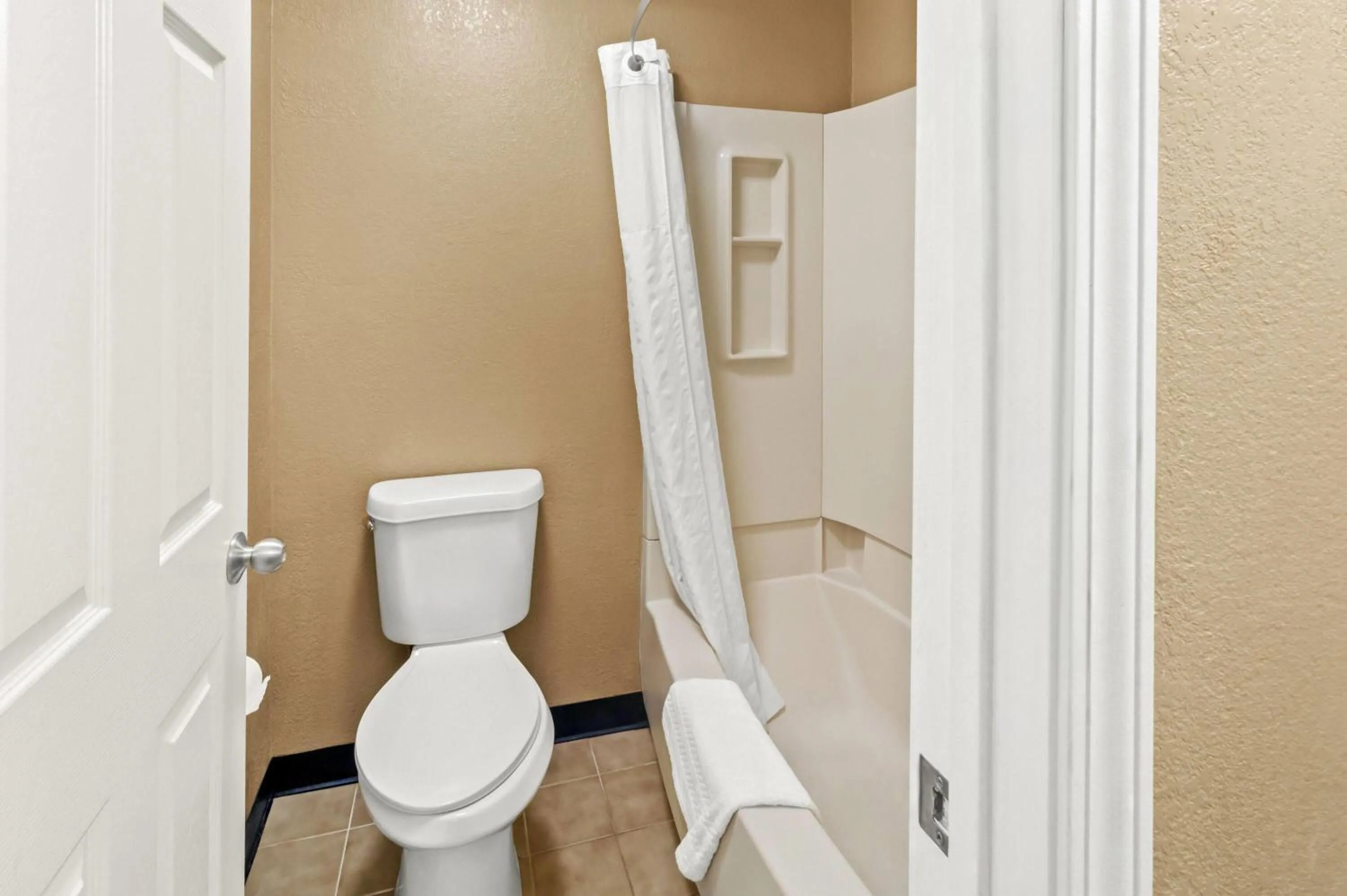 Bathroom in Super 8 by Wyndham Cincinnati-Springdale OH