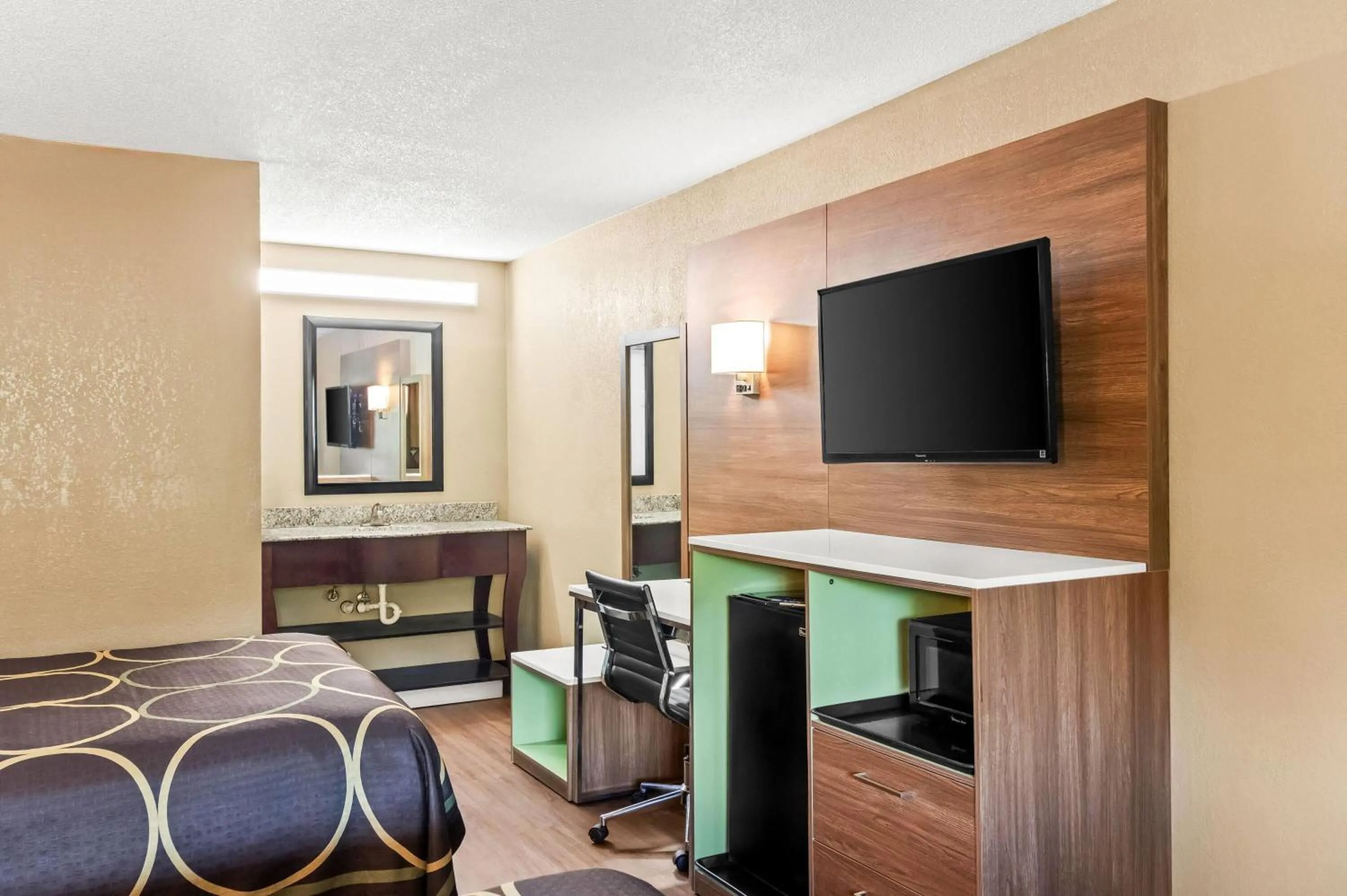 Bed in Super 8 by Wyndham Cincinnati-Springdale OH