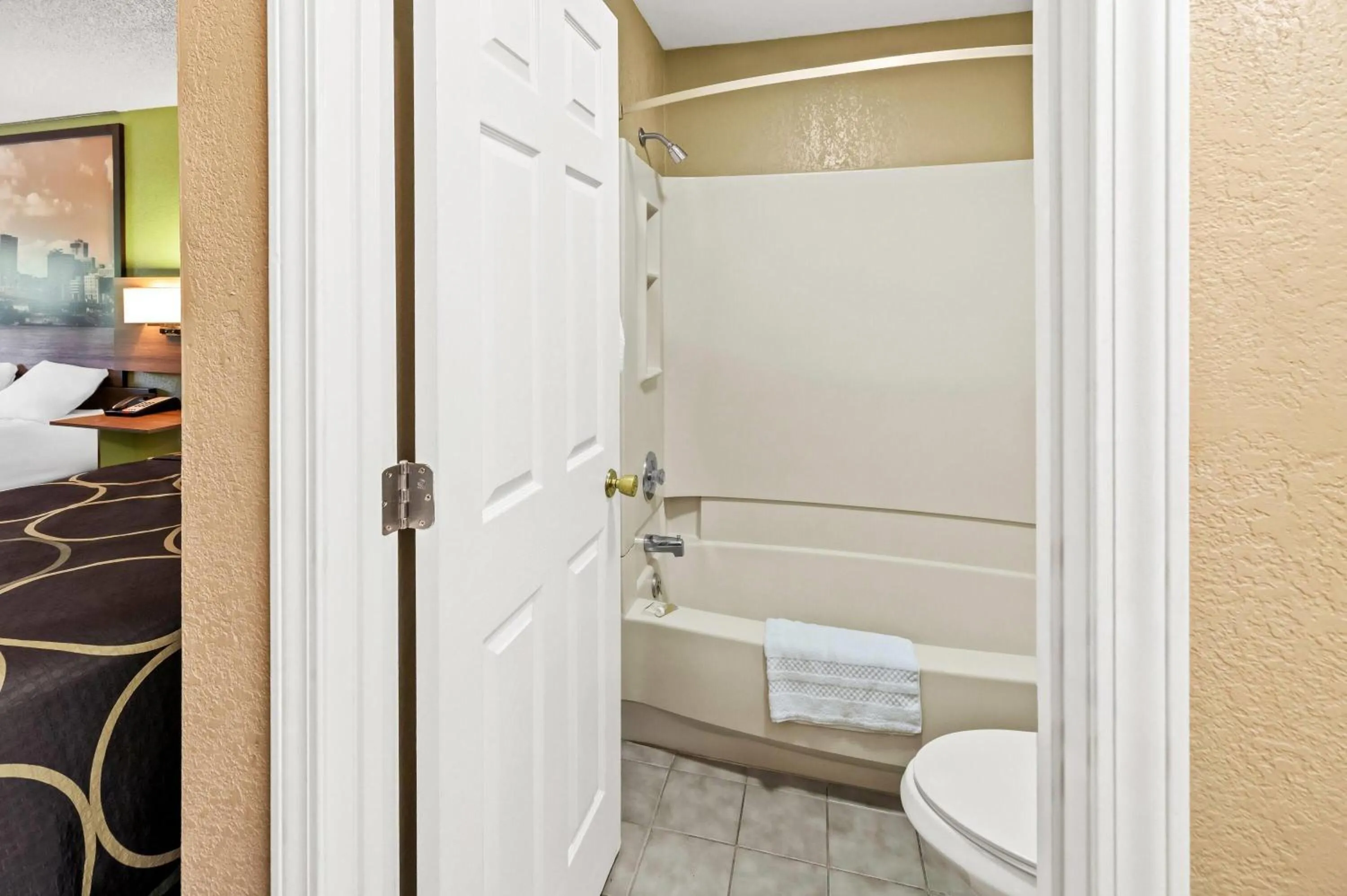 Bathroom in Super 8 by Wyndham Cincinnati-Springdale OH