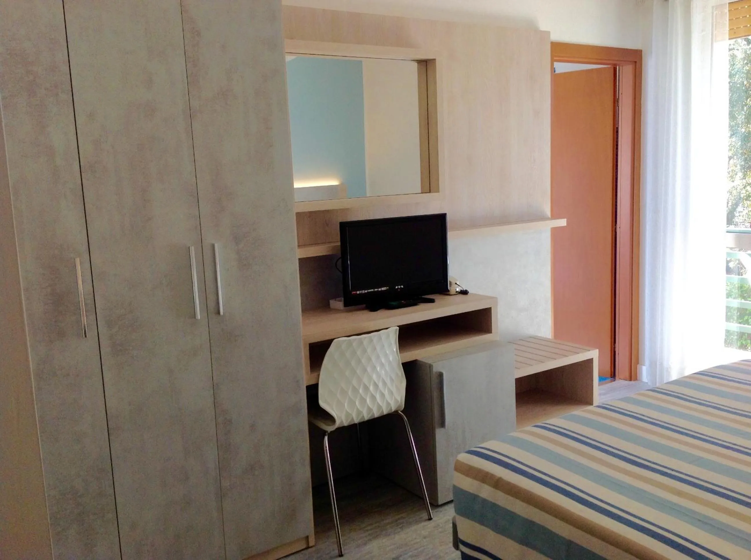 Photo of the whole room in La Coccinella Residence