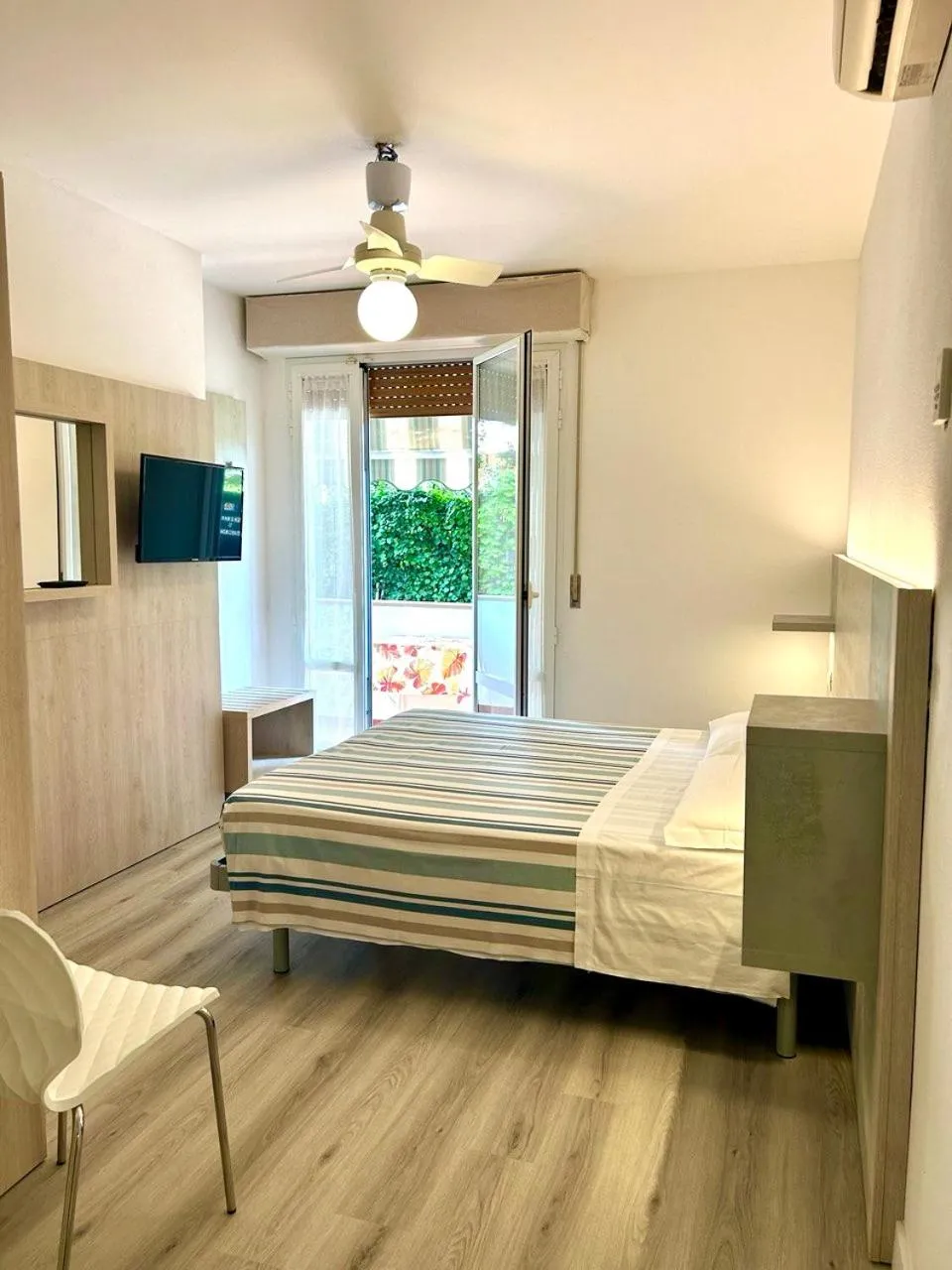 Bedroom in La Coccinella Residence