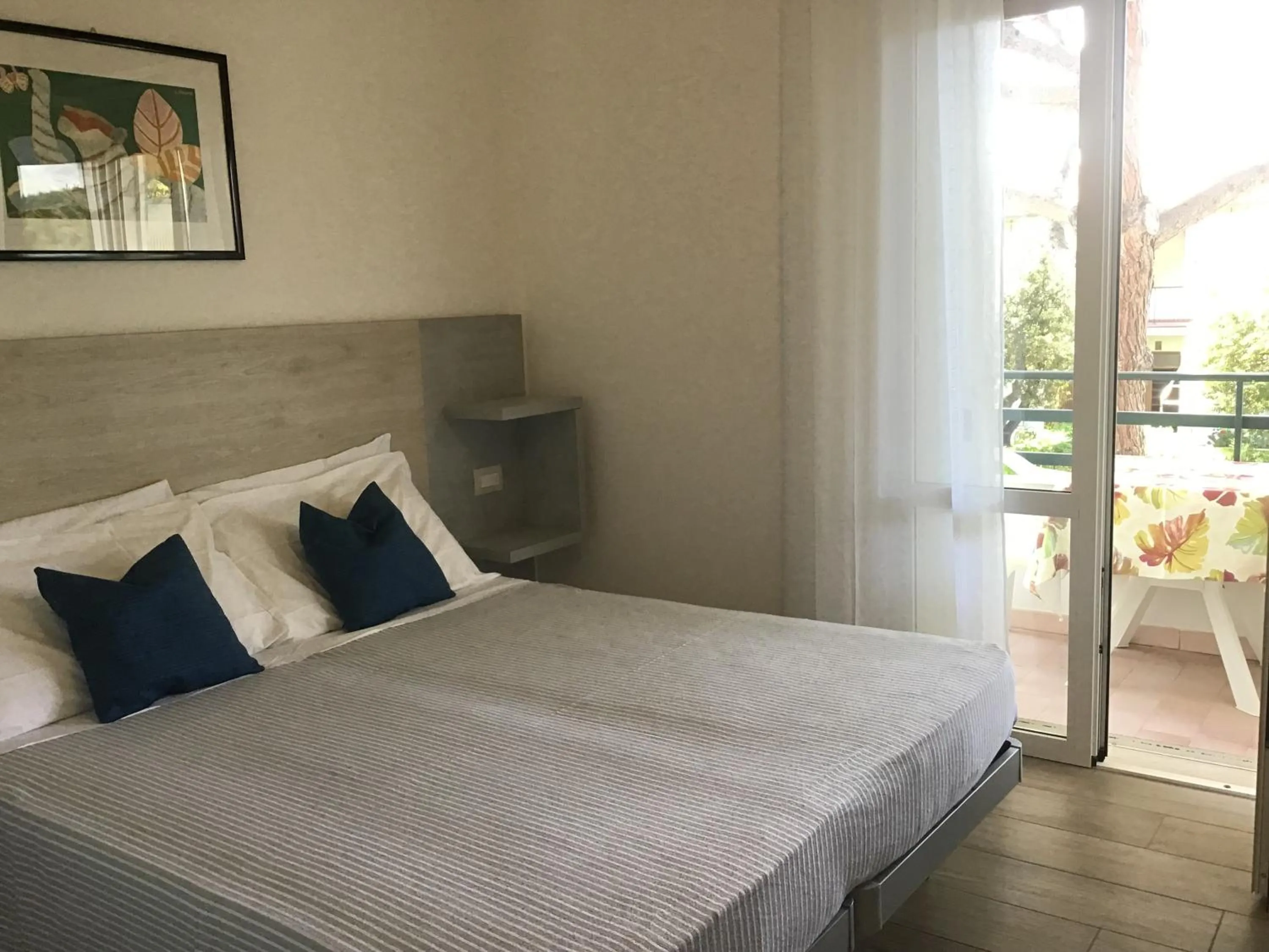 Bedroom in La Coccinella Residence