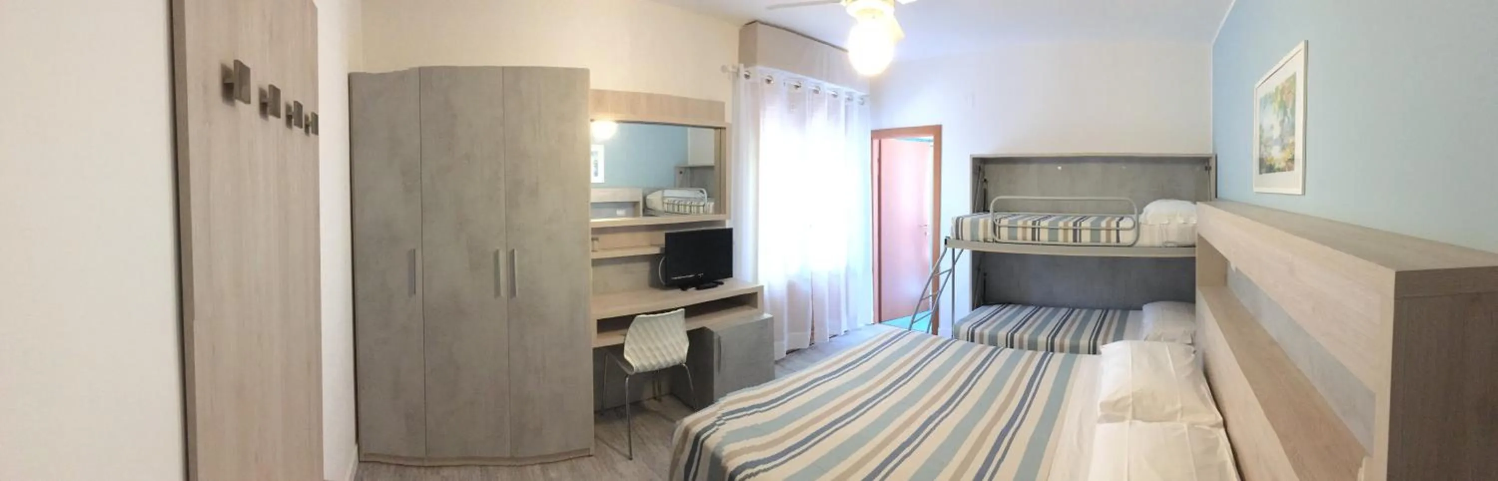 Photo of the whole room in La Coccinella Residence