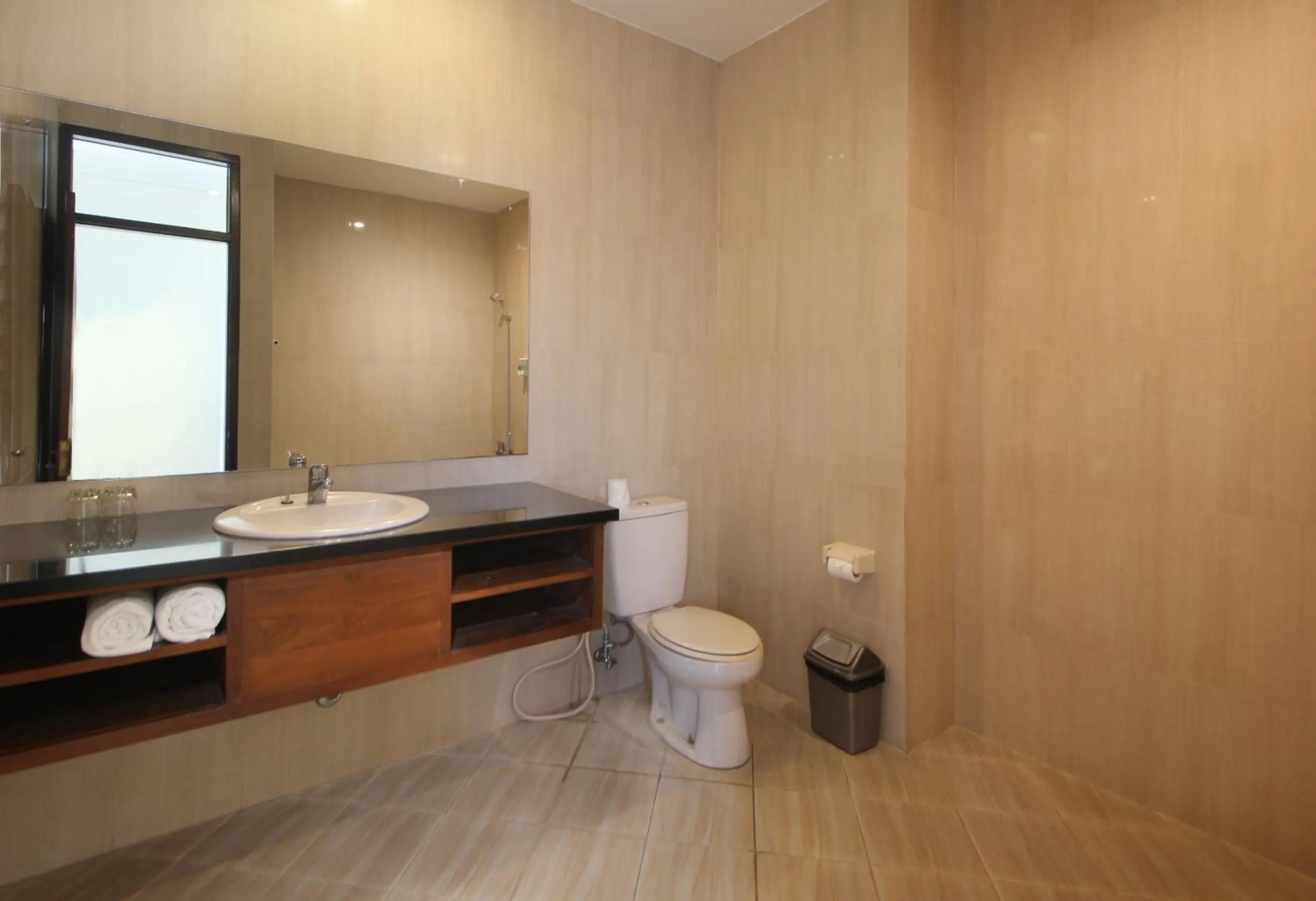 Bathroom in Putri Ayu Cottages