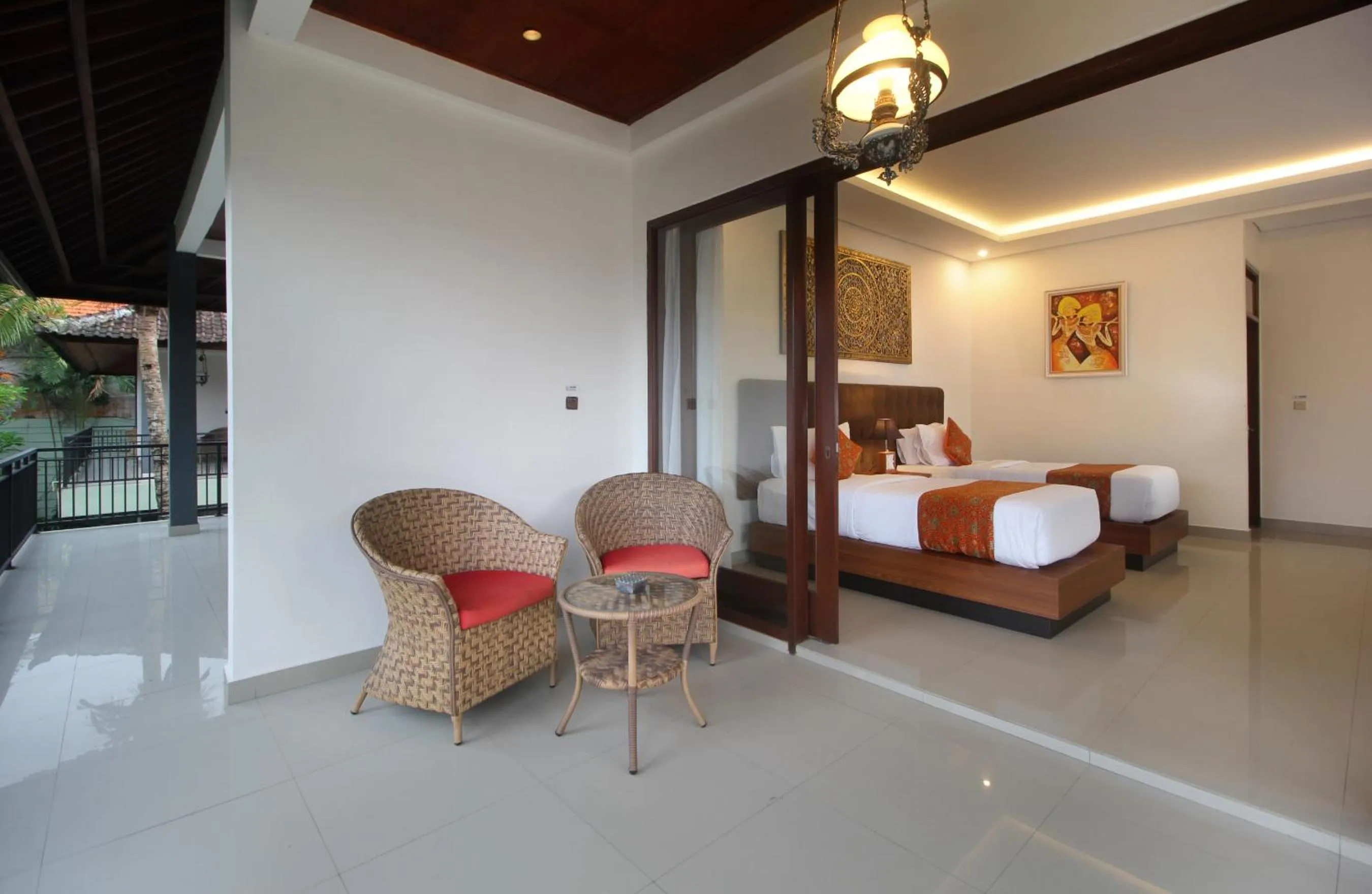 Balcony/Terrace, Bed in Putri Ayu Cottages