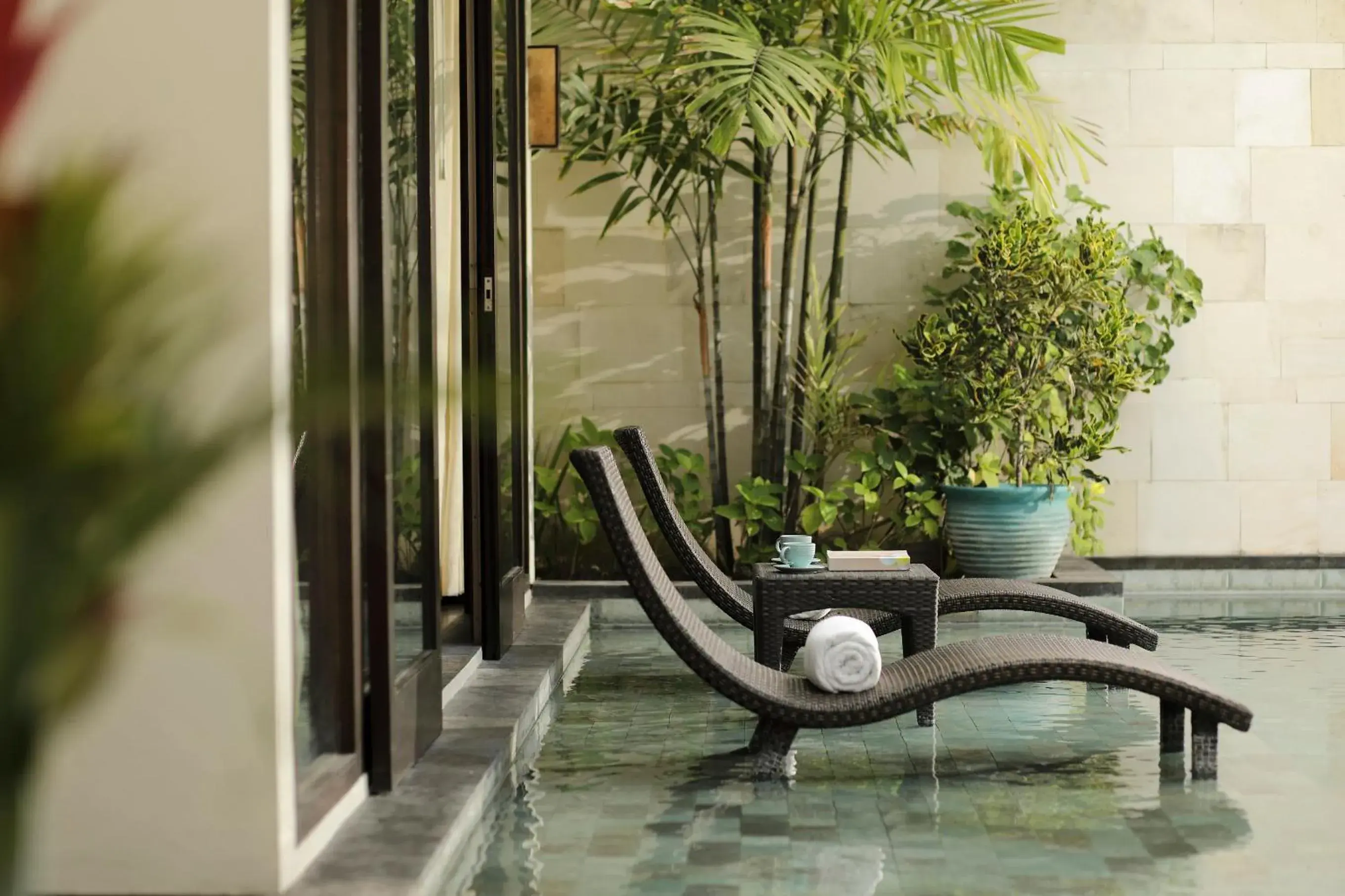 Swimming pool in The Seminyak Beach Resort & Spa Swimming pool in The Seminyak Beach Resort & Spa