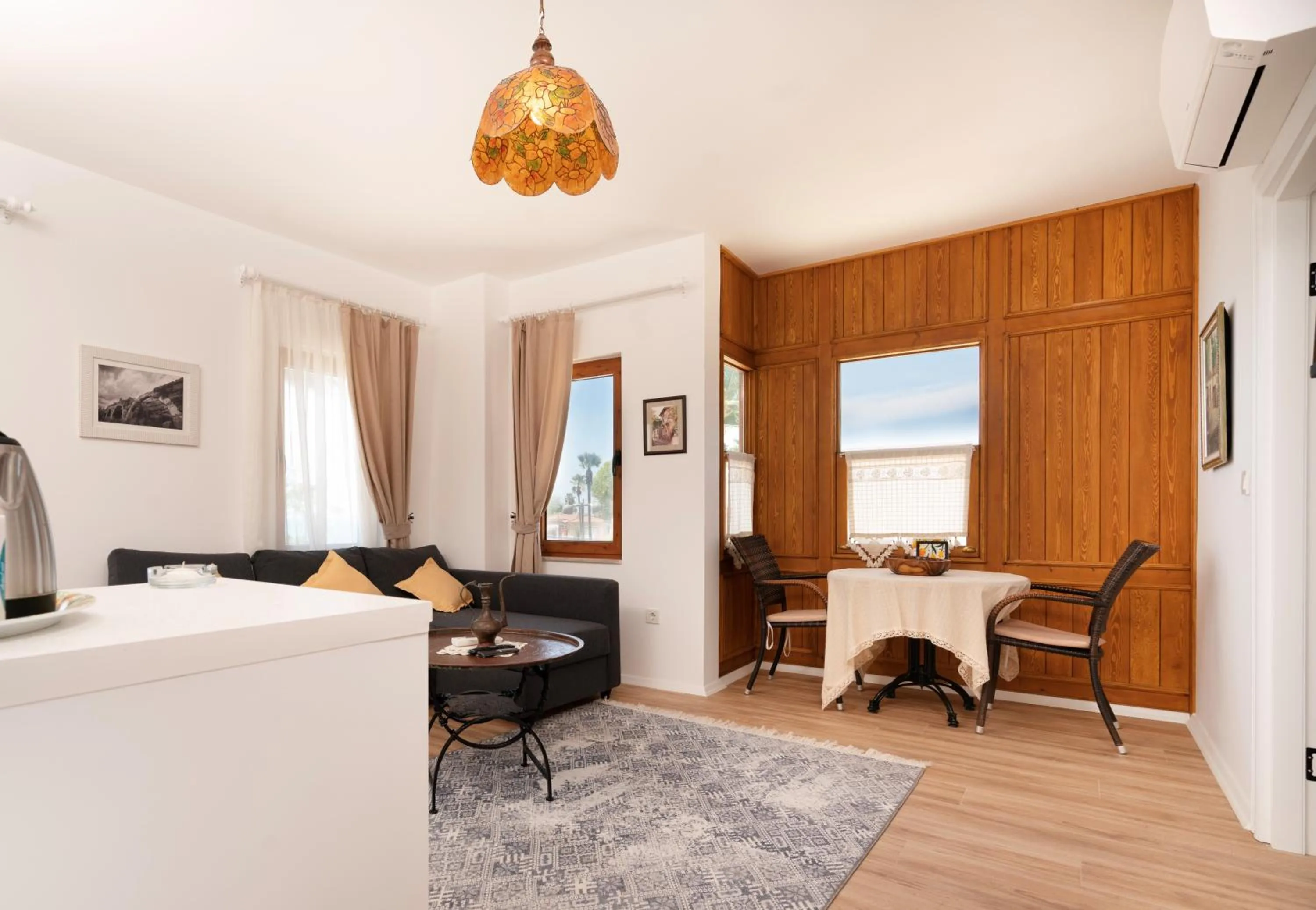 Living room, Bed in Beach House Hotel