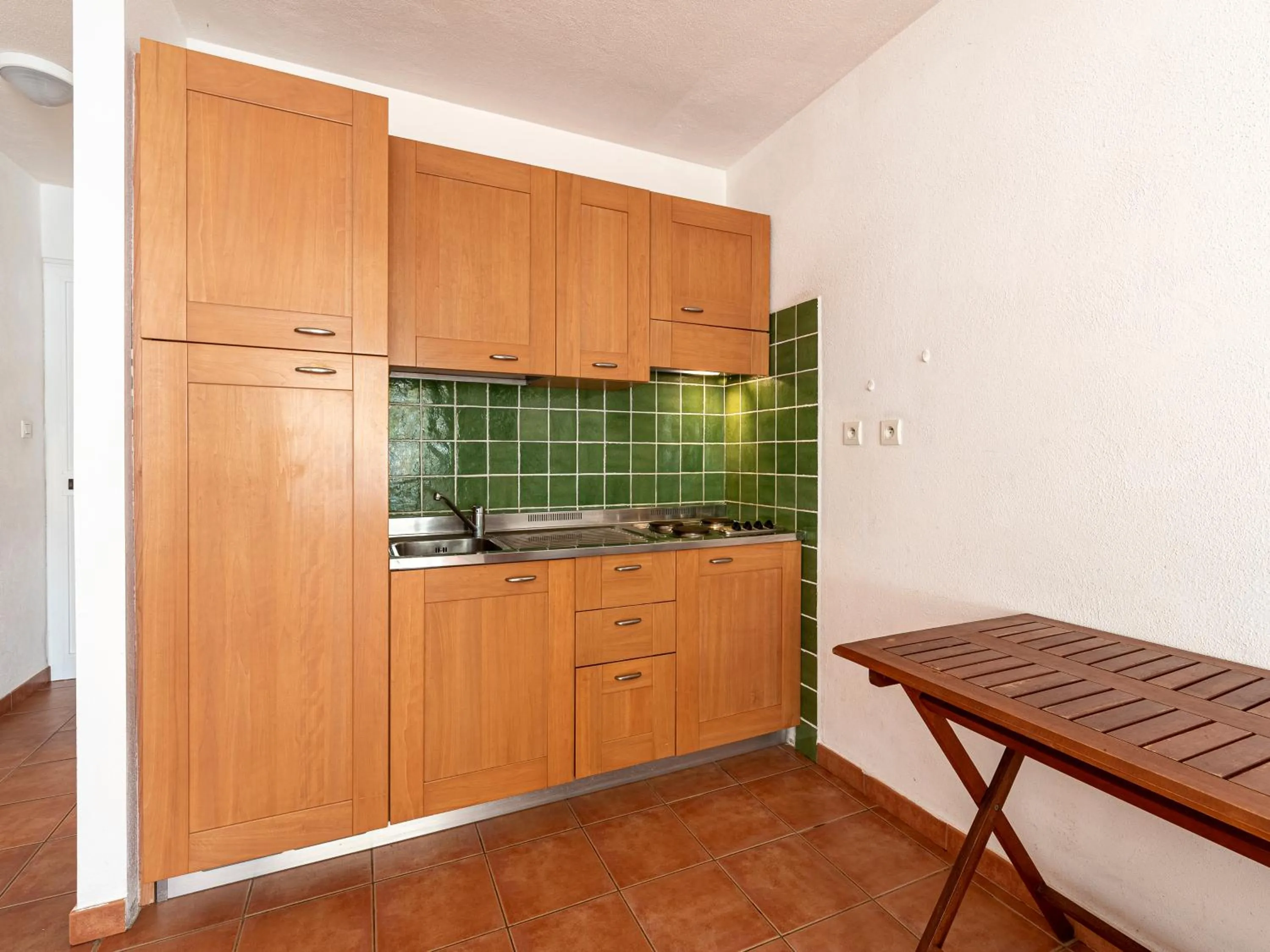 Kitchen or kitchenette in Vacancéole - Résidence Sognu di Rena