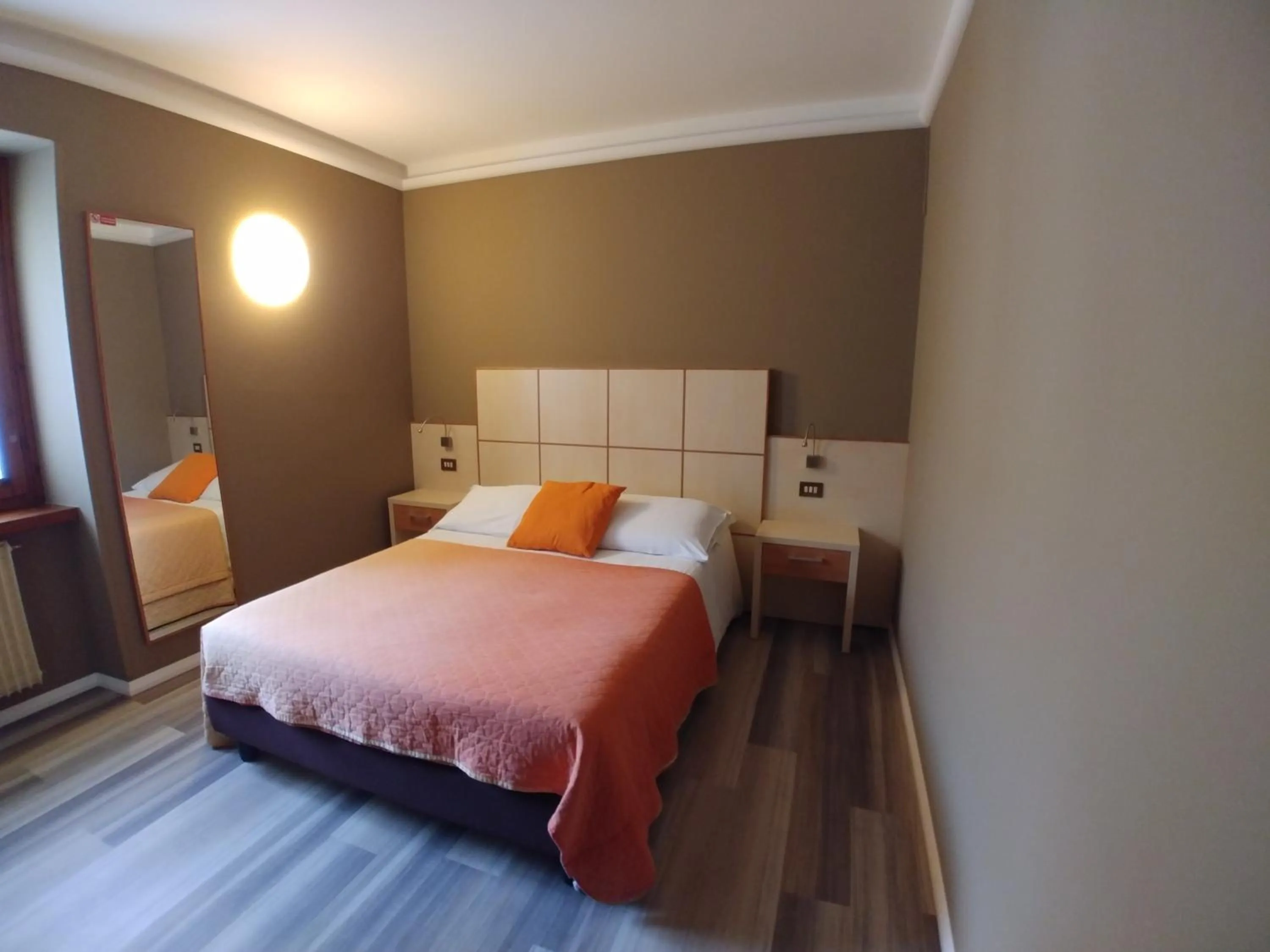 Bed in Albergo Aurora