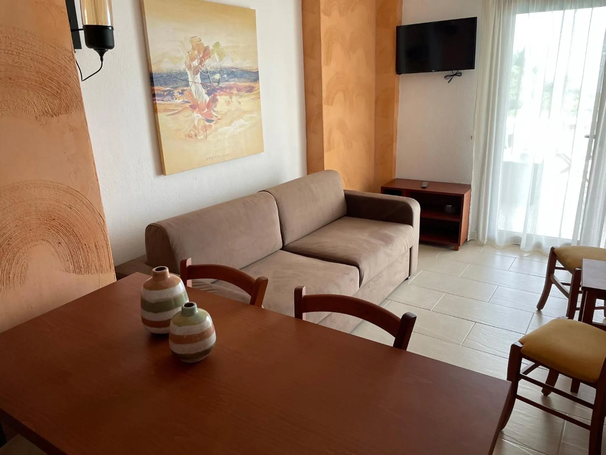 Living room in Koumaros Aparthotel