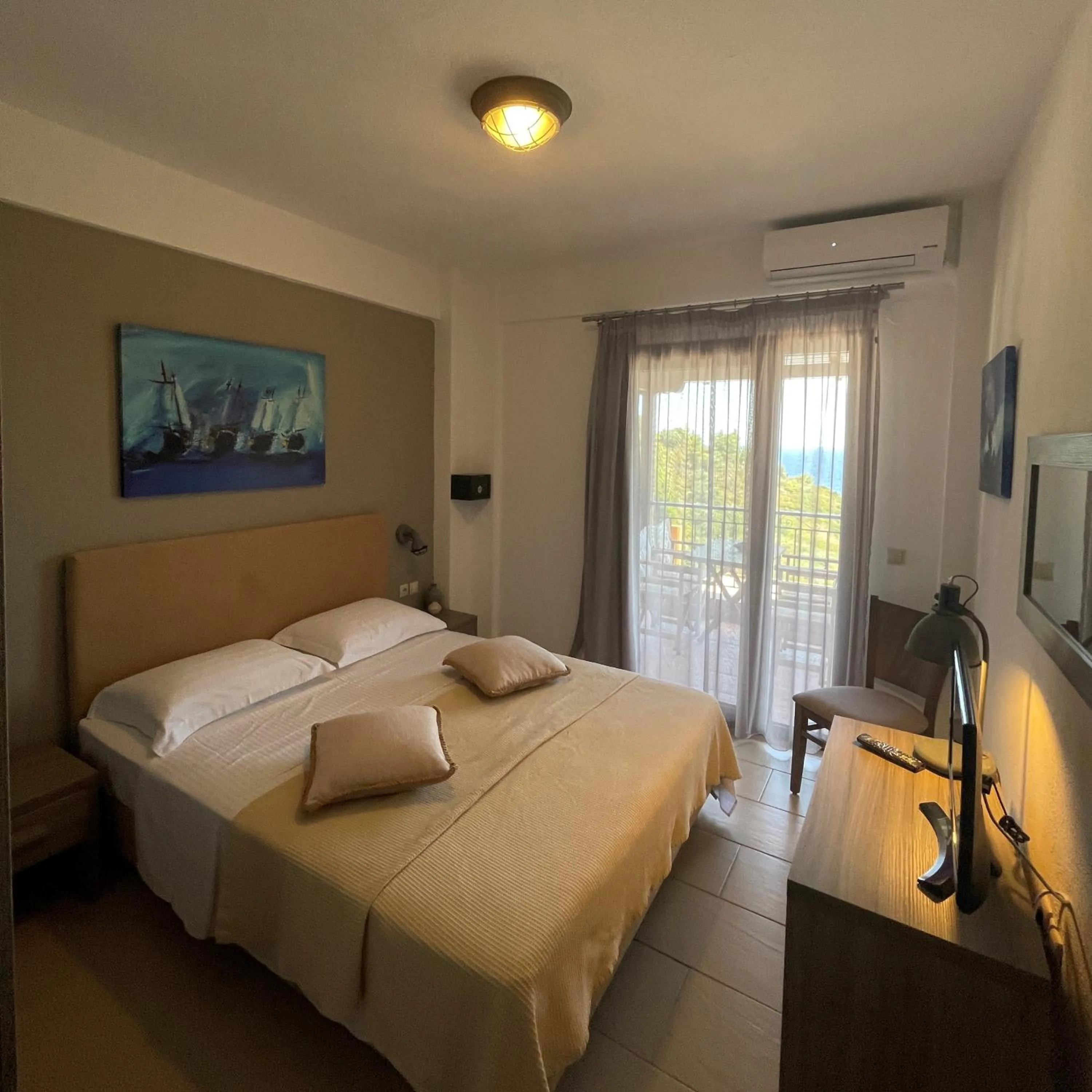 Bed in Koumaros Aparthotel