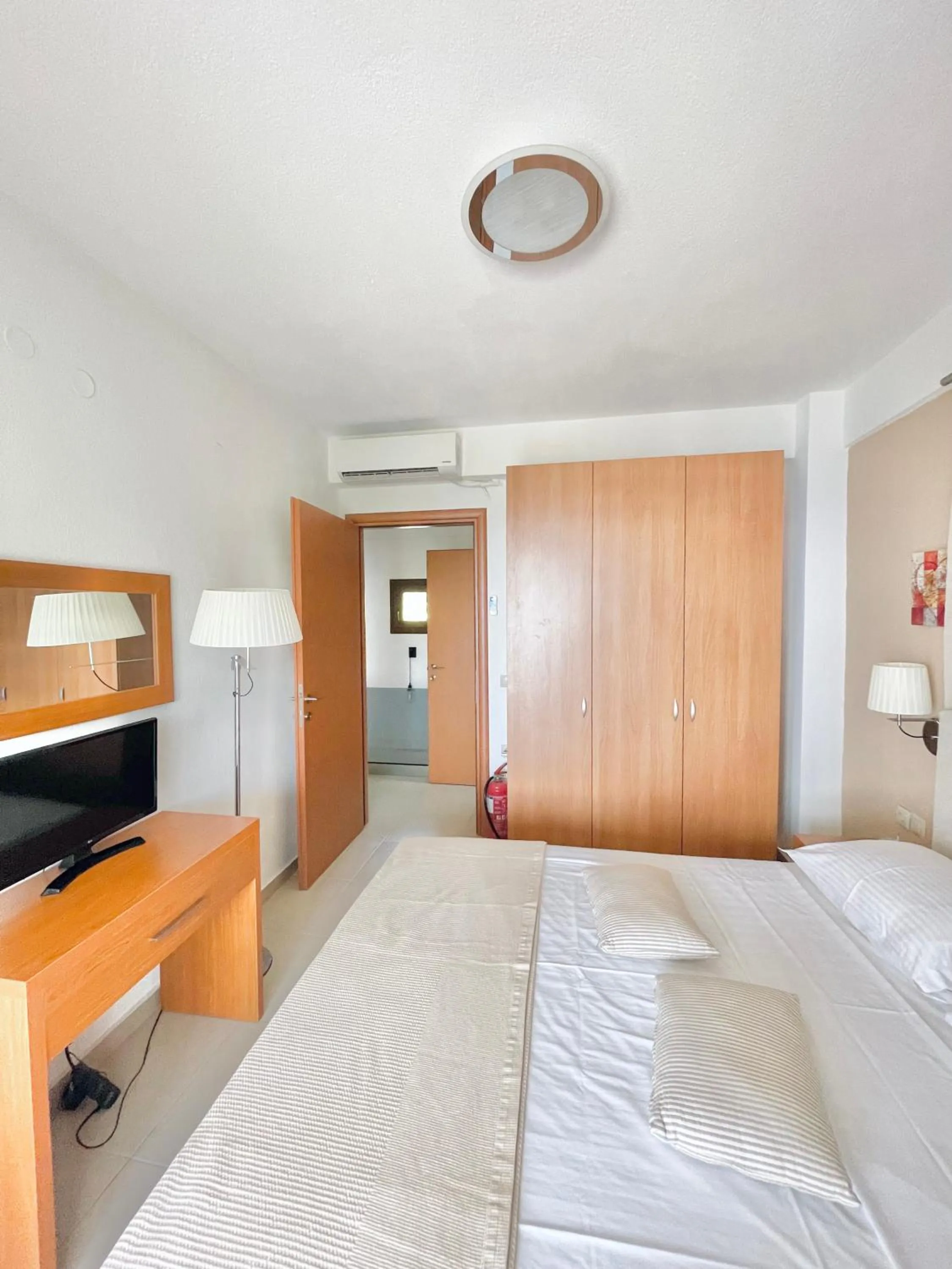 Bed in Koumaros Aparthotel