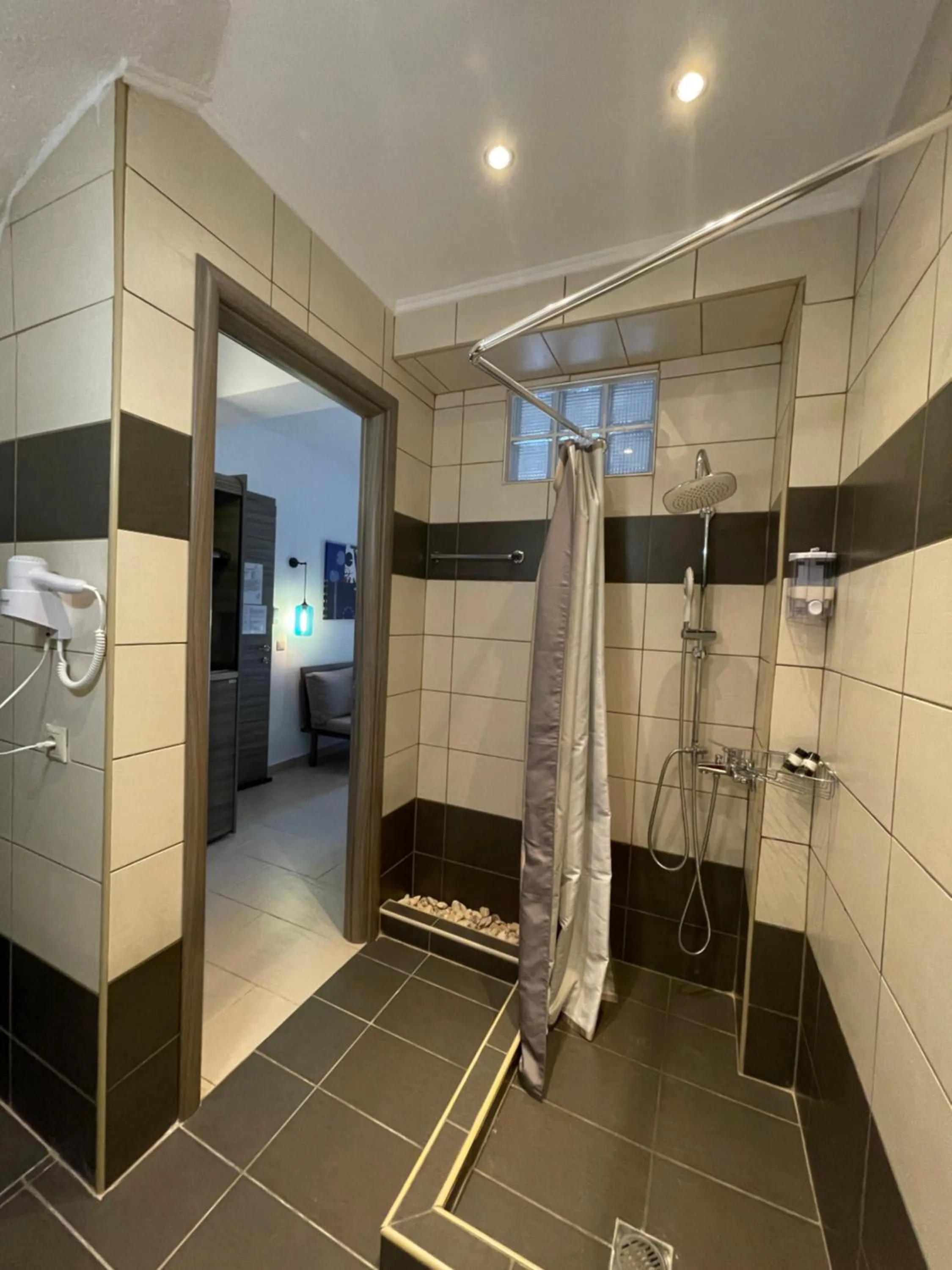 Shower in Koumaros Aparthotel