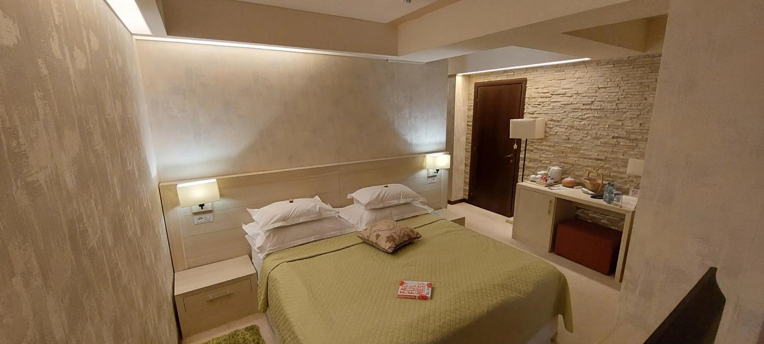 Bed in Ioana Boutique Hotel