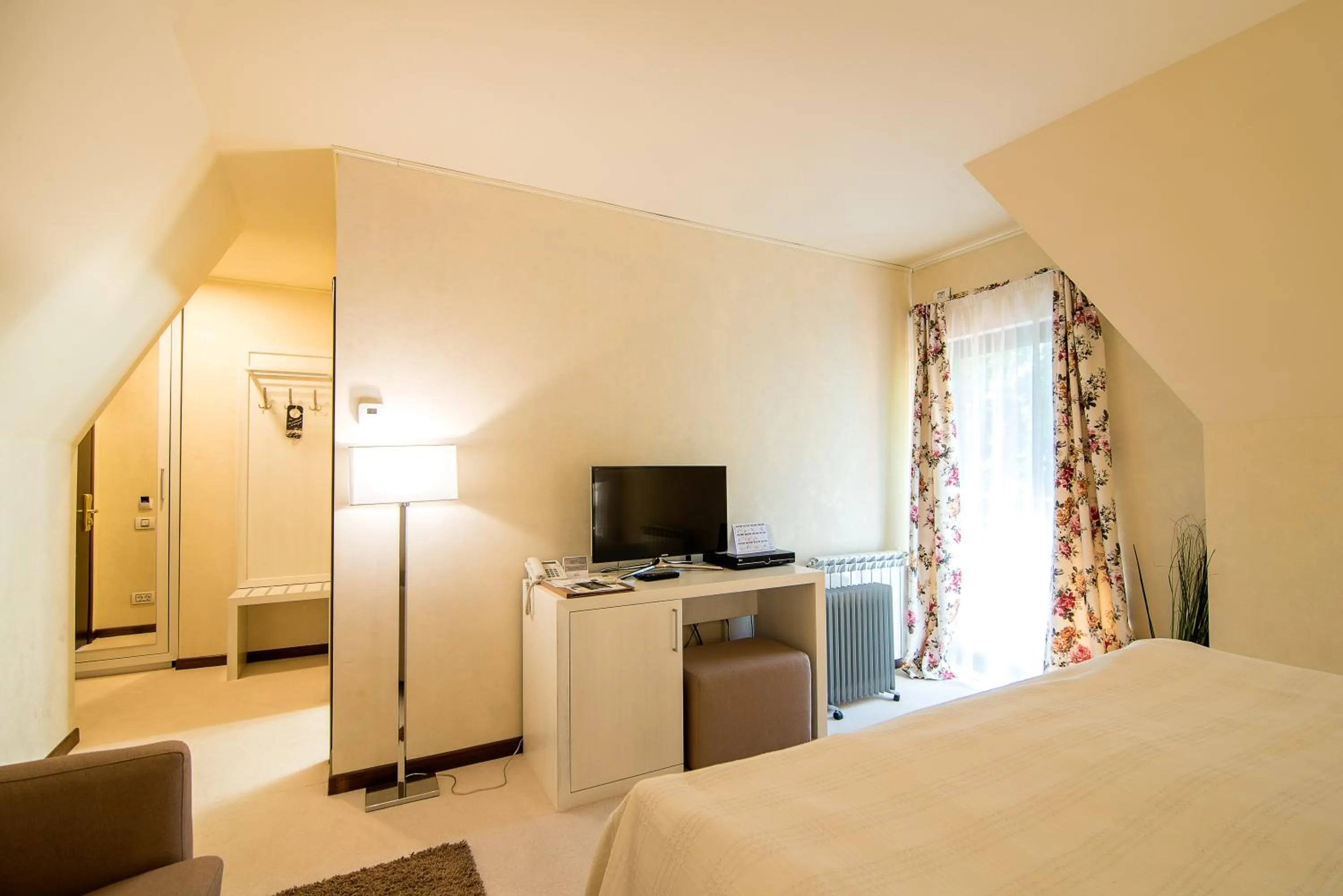 Bed in Ioana Boutique Hotel