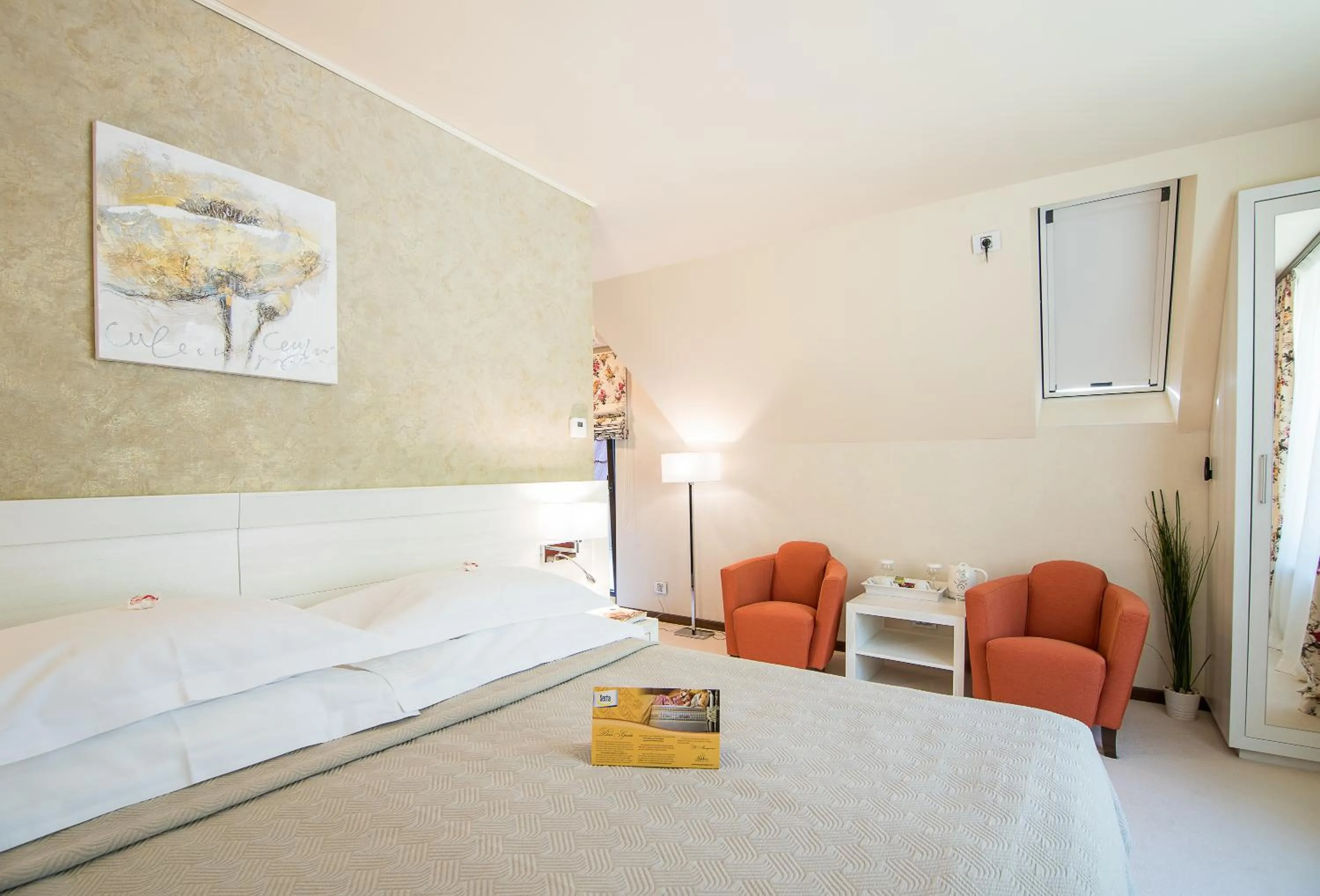 Bed in Ioana Boutique Hotel