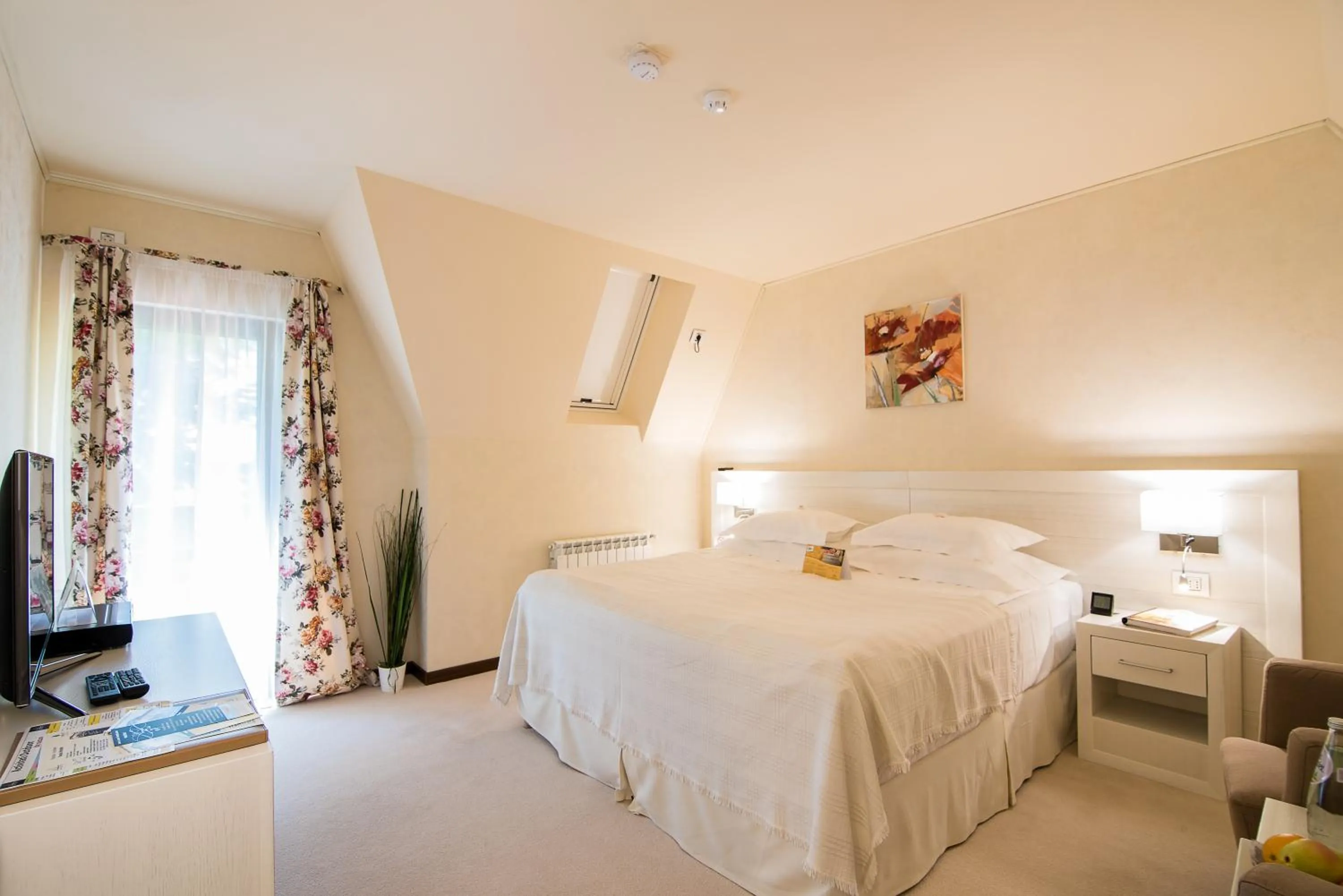 Bed in Ioana Boutique Hotel