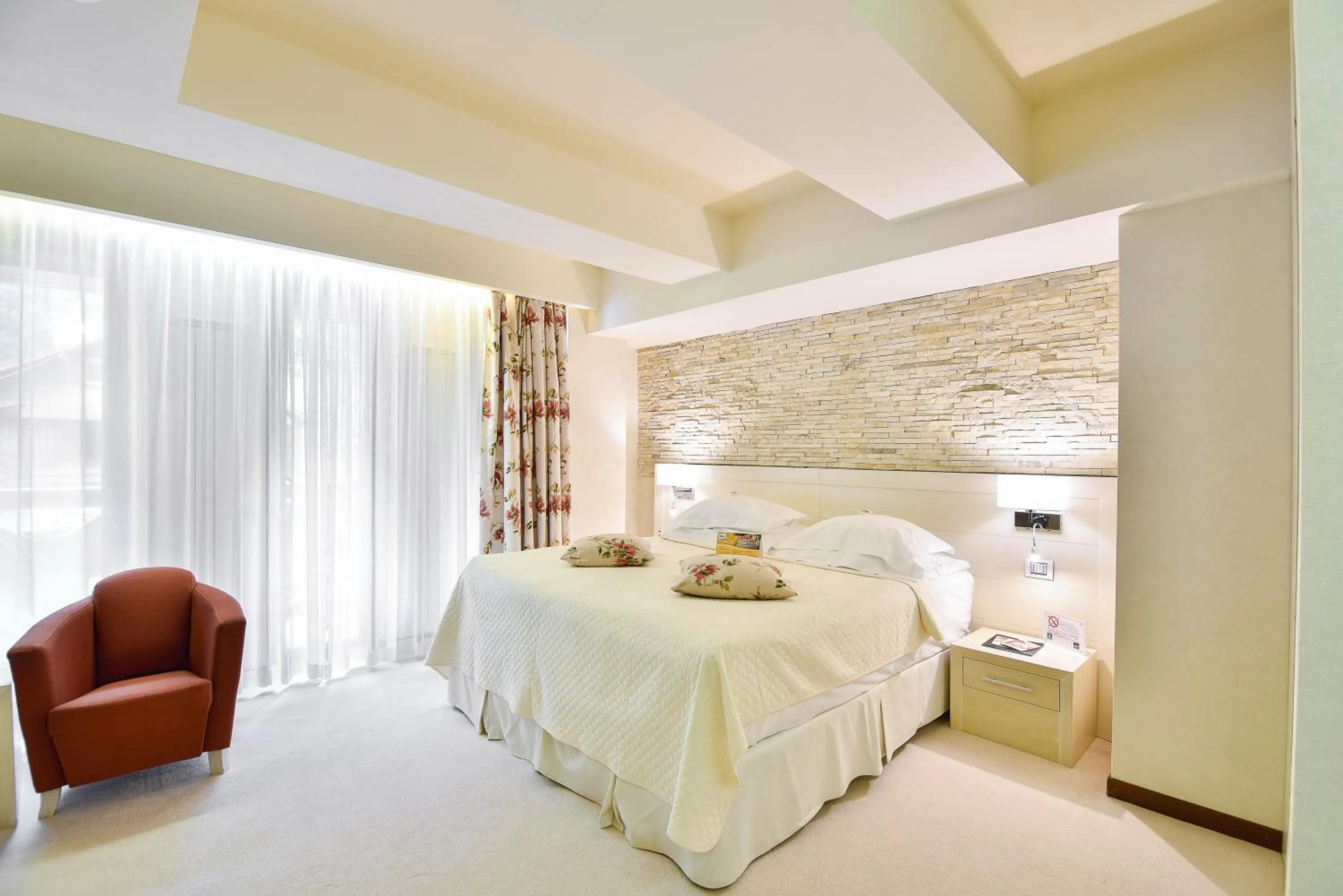 Bed in Ioana Boutique Hotel