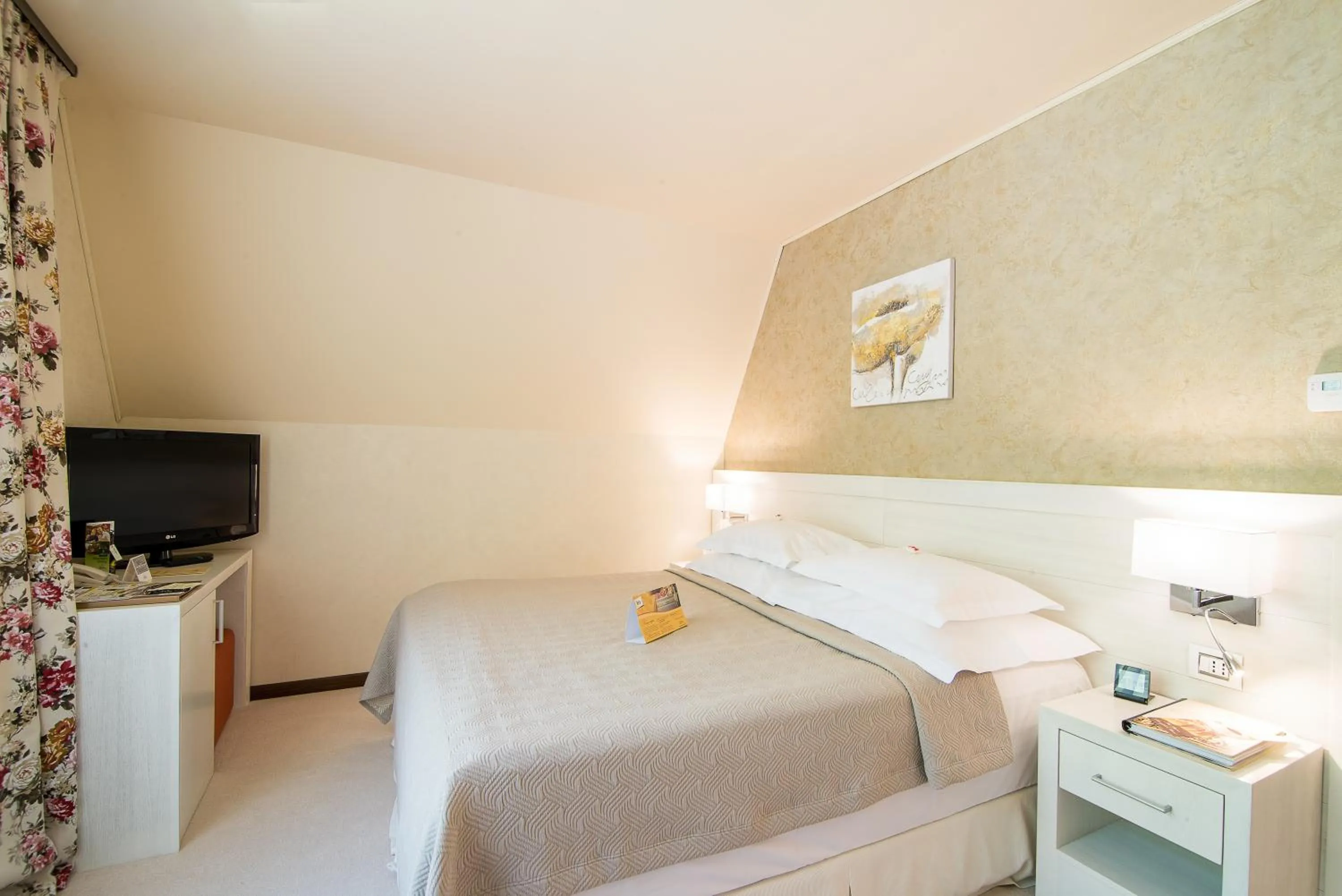 Bed in Ioana Boutique Hotel