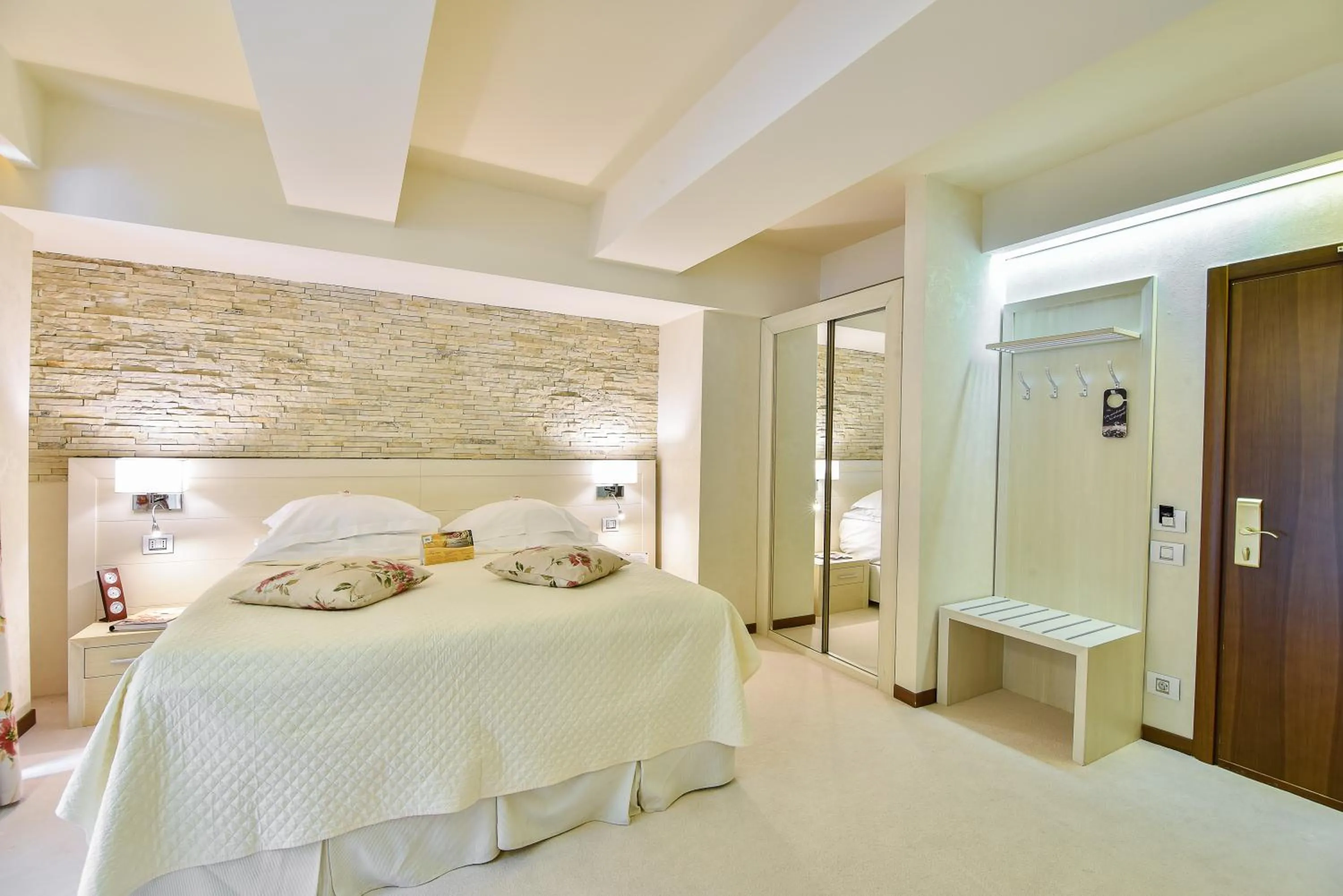 Bed in Ioana Boutique Hotel