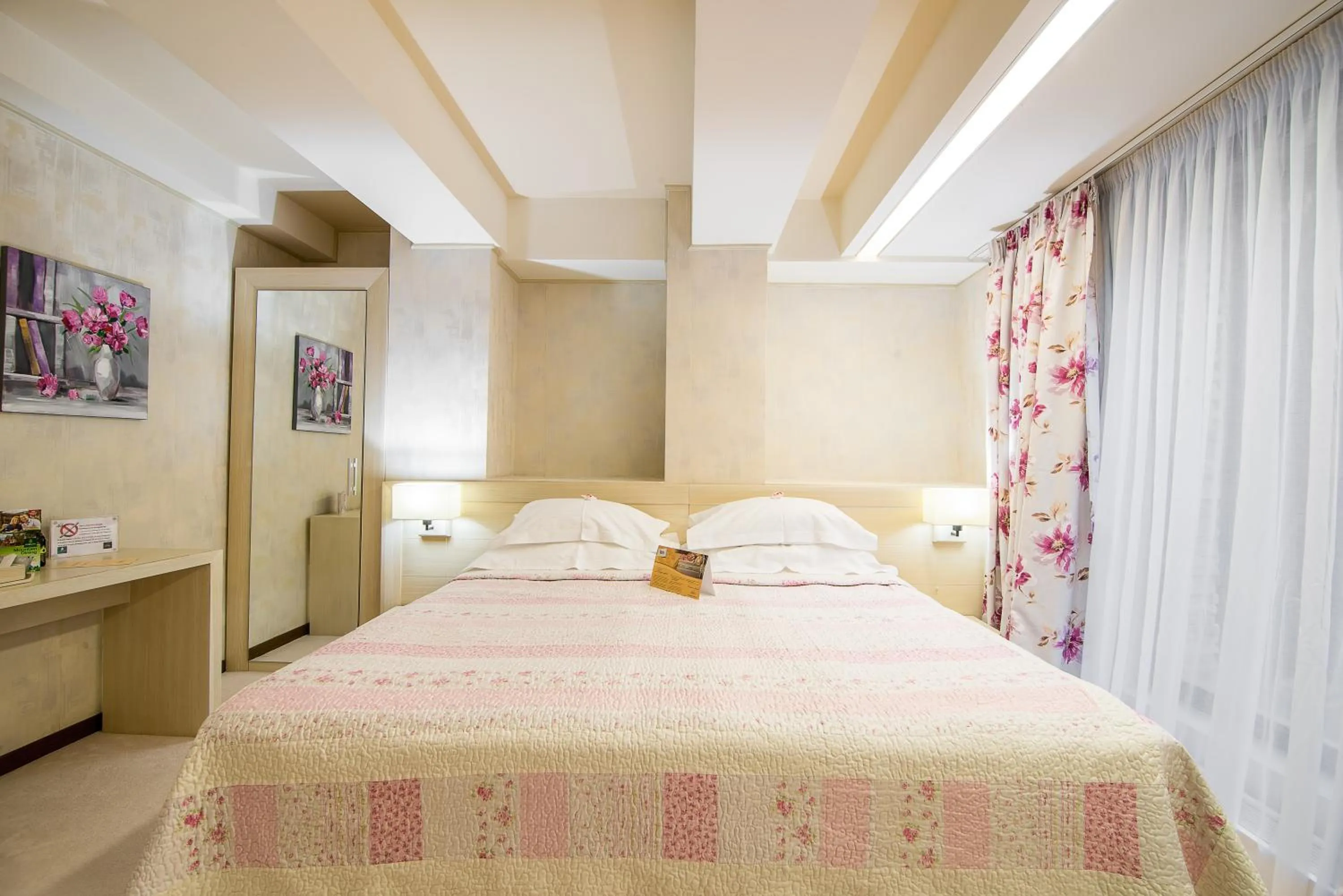 Bed in Ioana Boutique Hotel