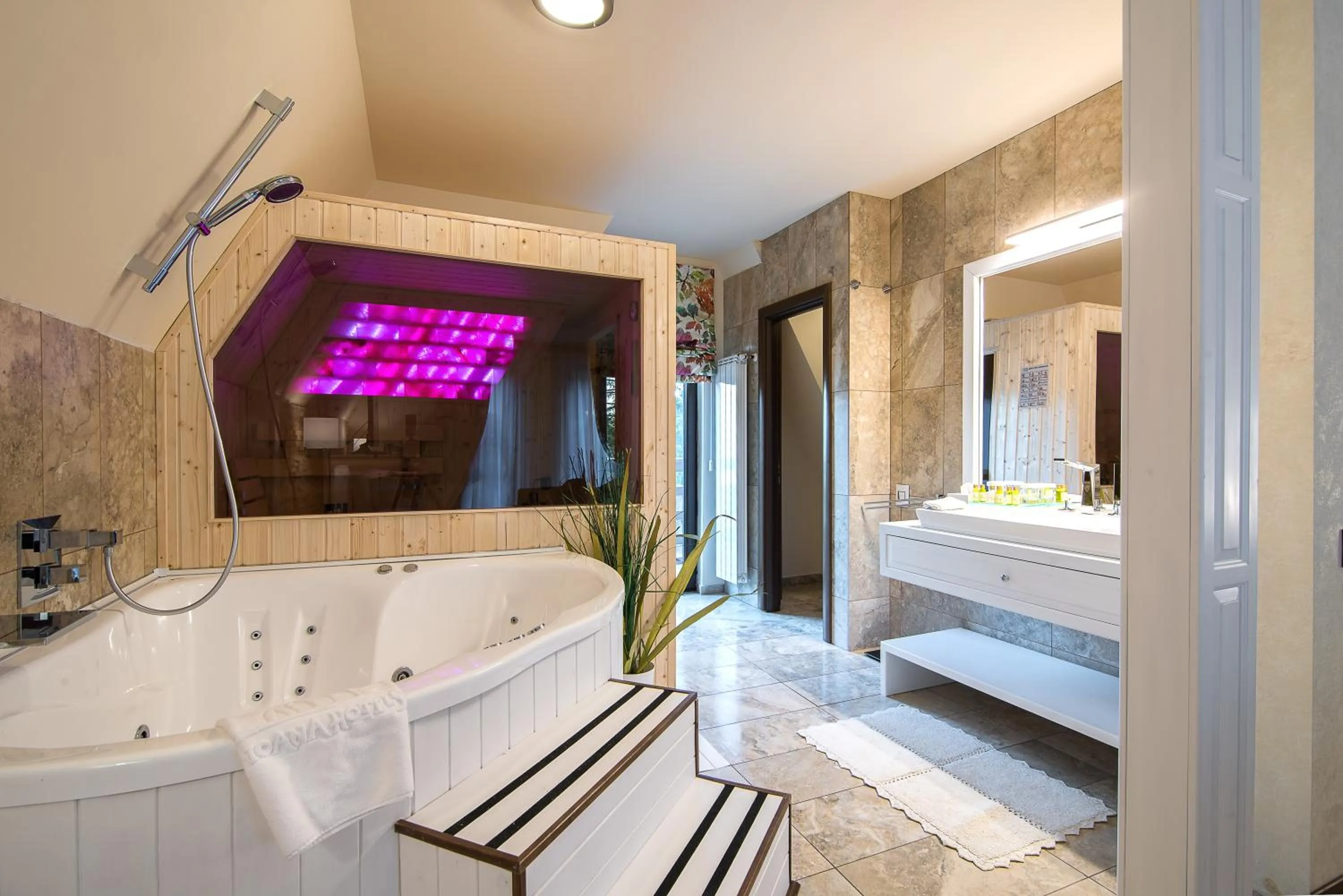 Bed in Ioana Boutique Hotel