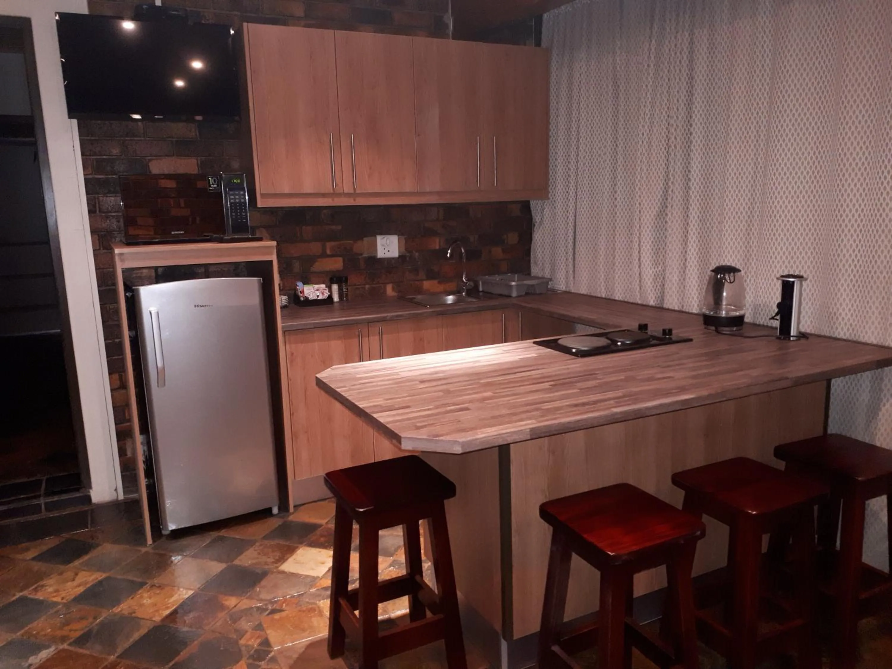 Kitchen or kitchenette in Blue Sea Guest House