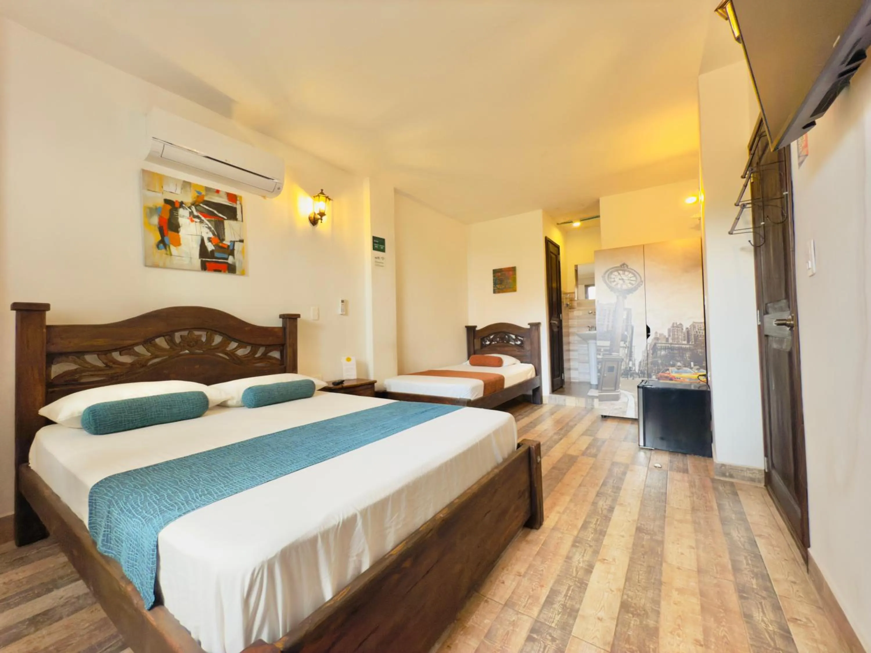 Photo of the whole room, Bed in Santiago DC Hotel