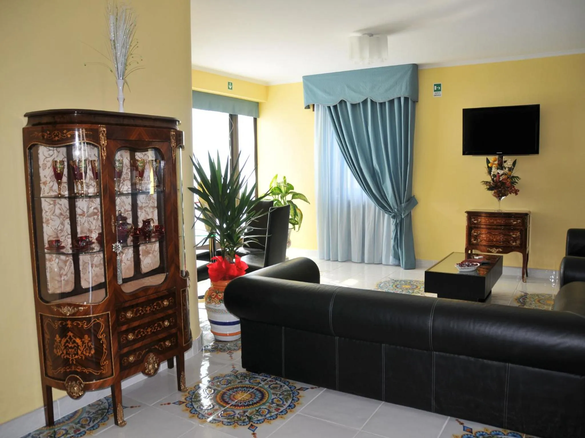 Communal lounge/ TV room in Costa Hotel