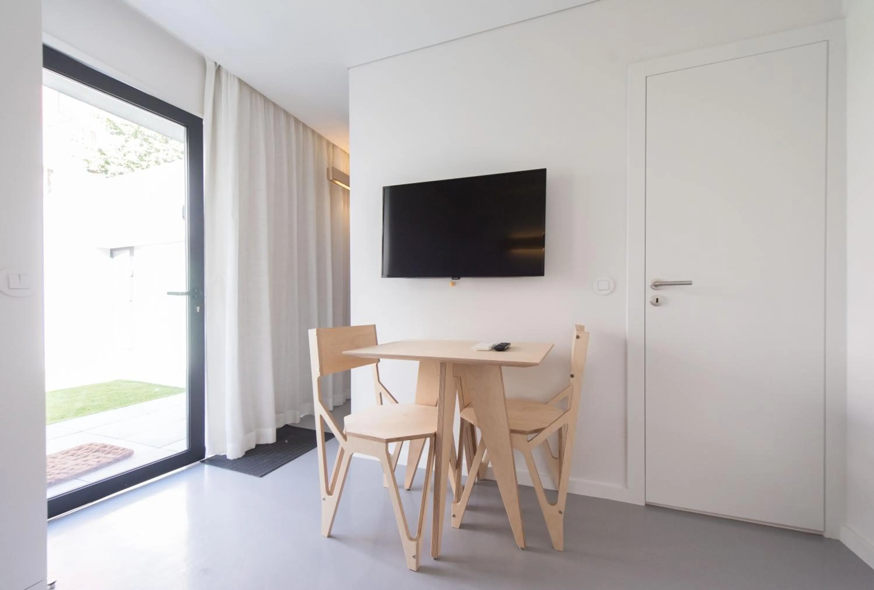 Communal lounge/ TV room in I Loft Porto