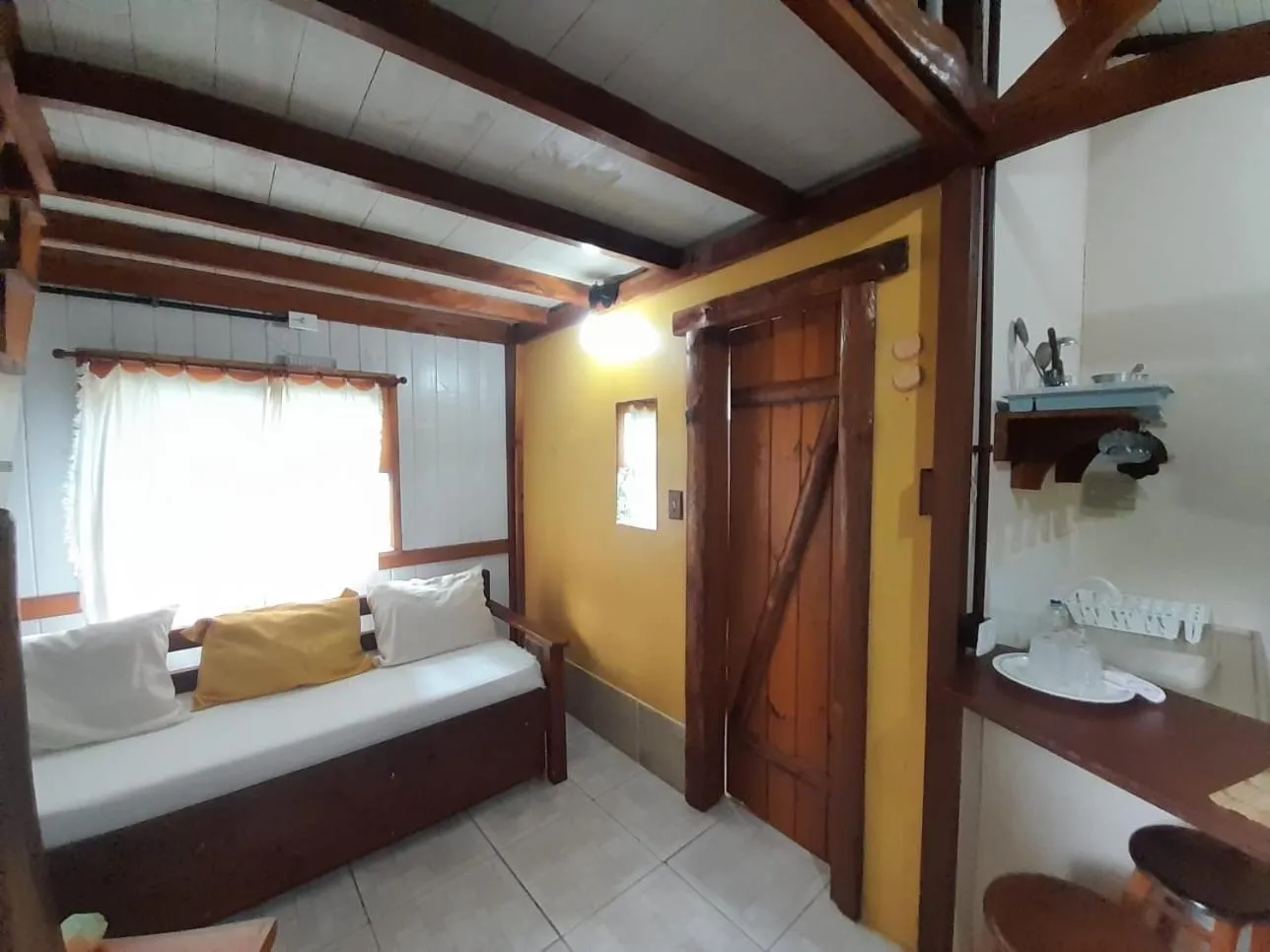 Bed in Recanto das Bromélias Chalés