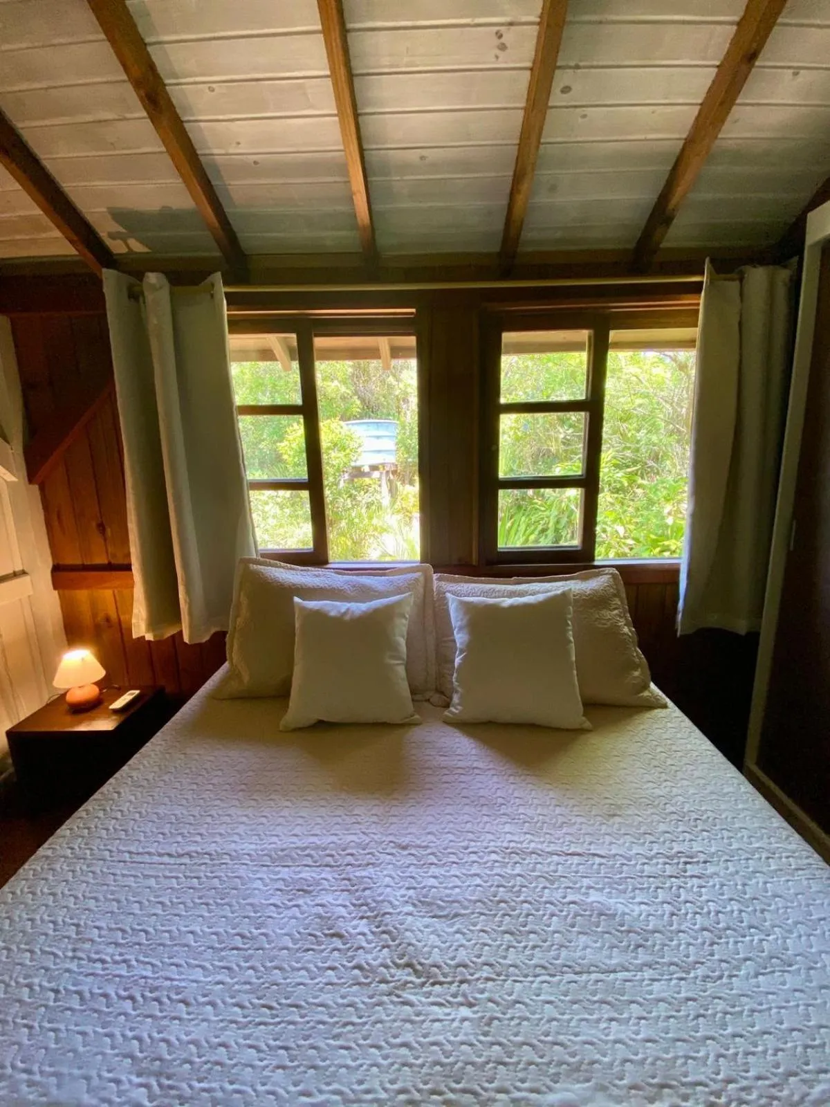 Bed in Recanto das Bromélias Chalés