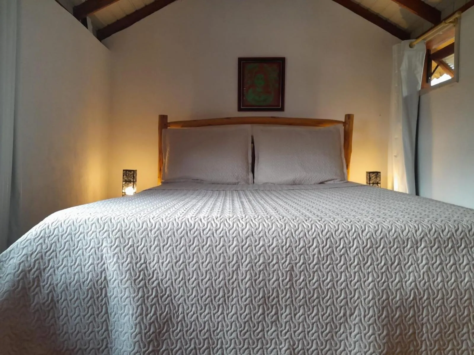 Bed in Recanto das Bromélias Chalés