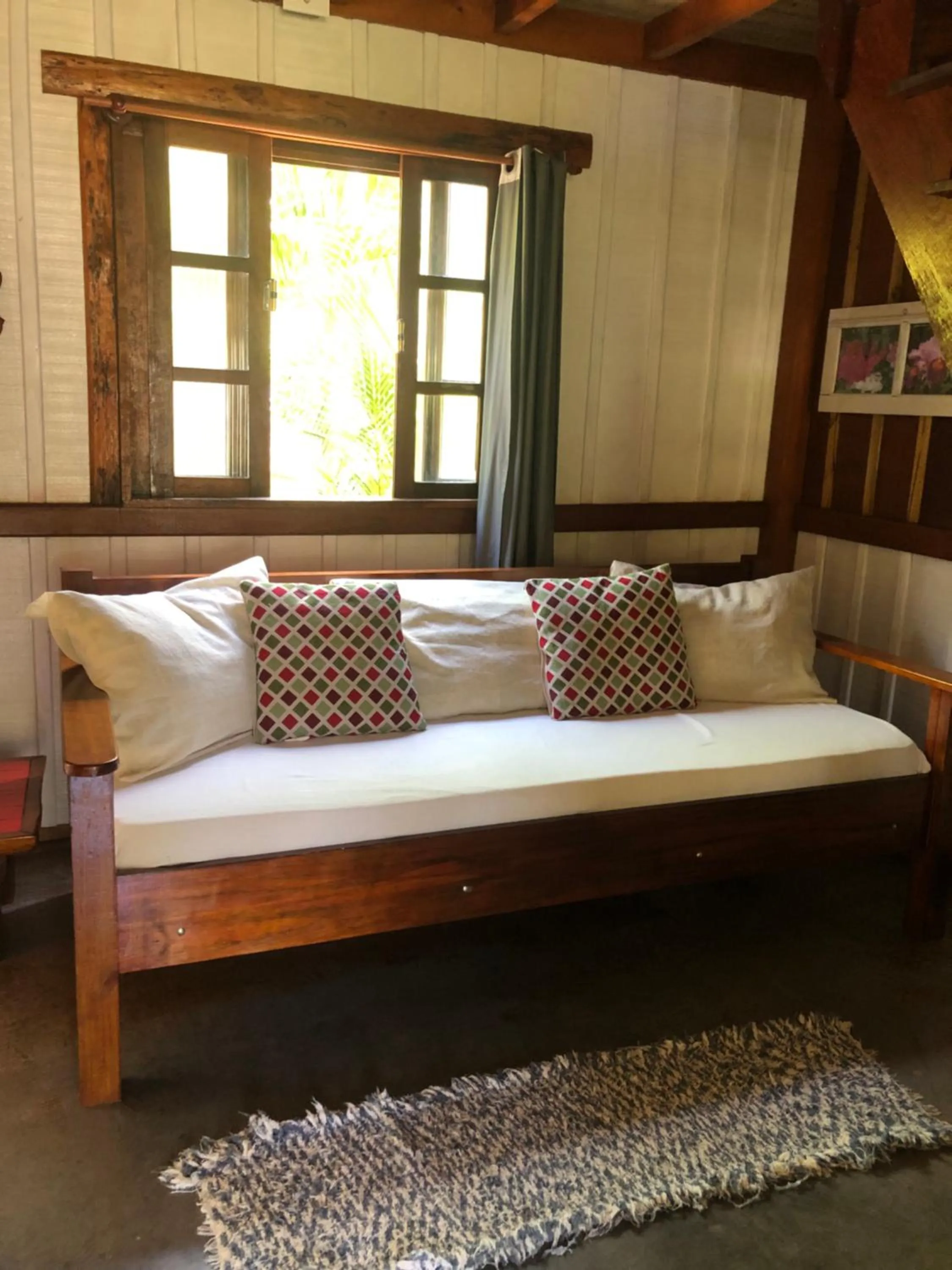 Bed in Recanto das Bromélias Chalés