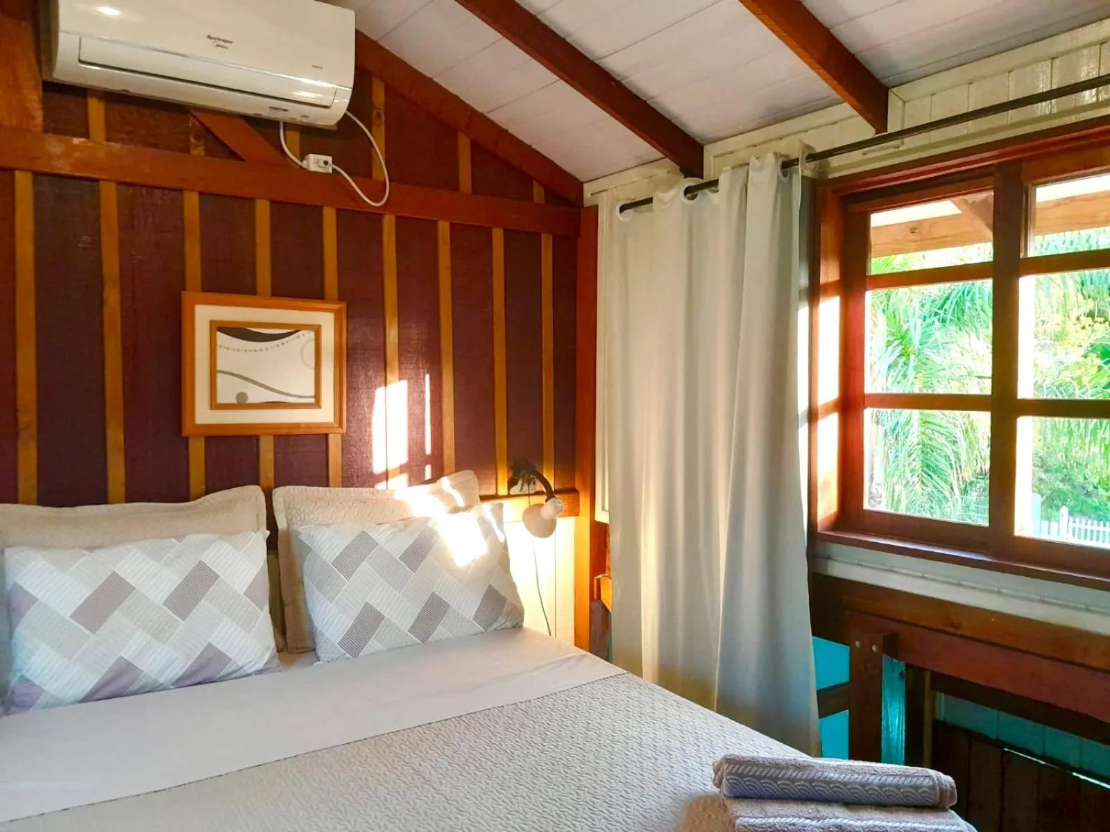 Bed in Recanto das Bromélias Chalés