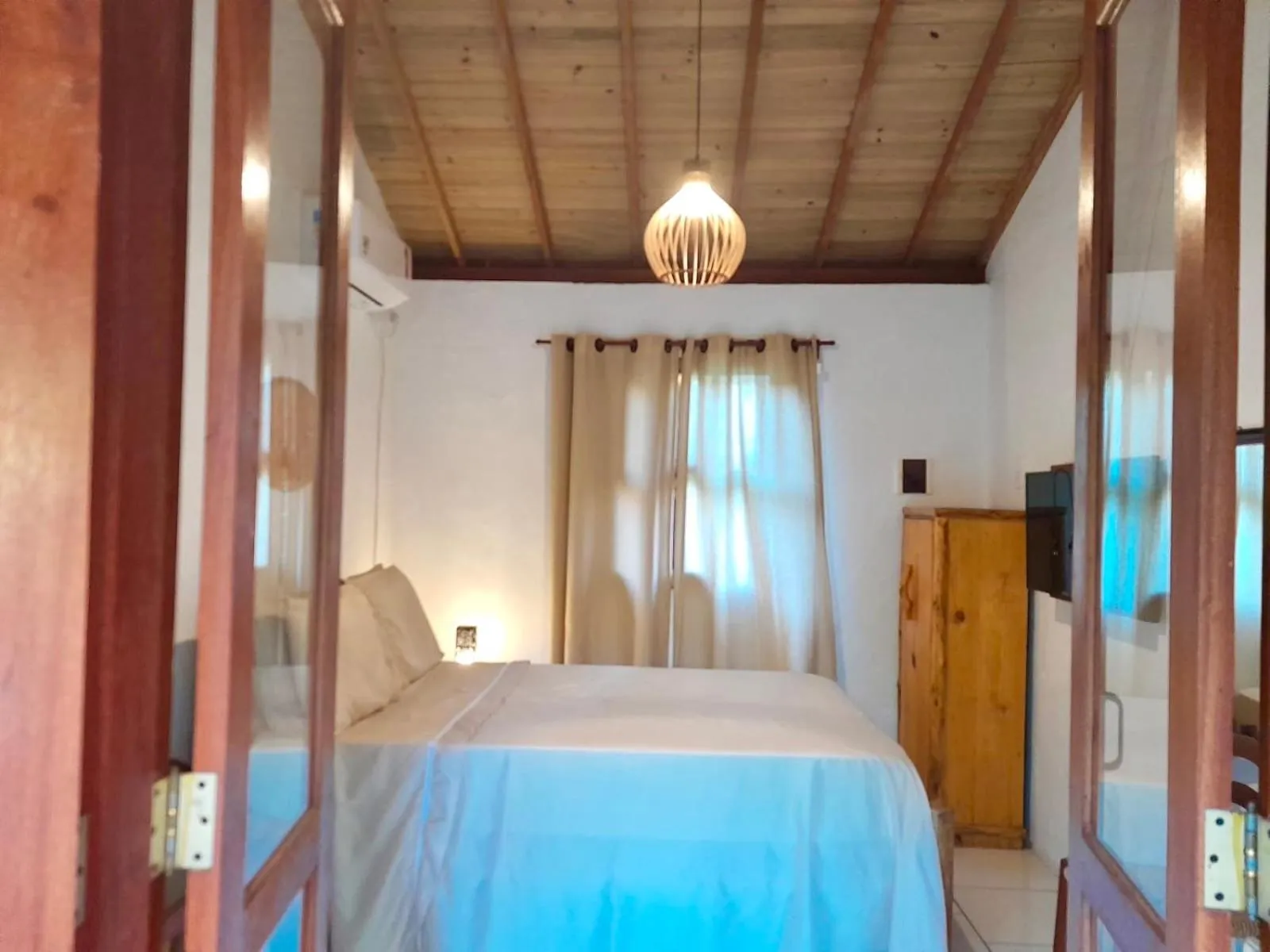 Bed in Recanto das Bromélias Chalés