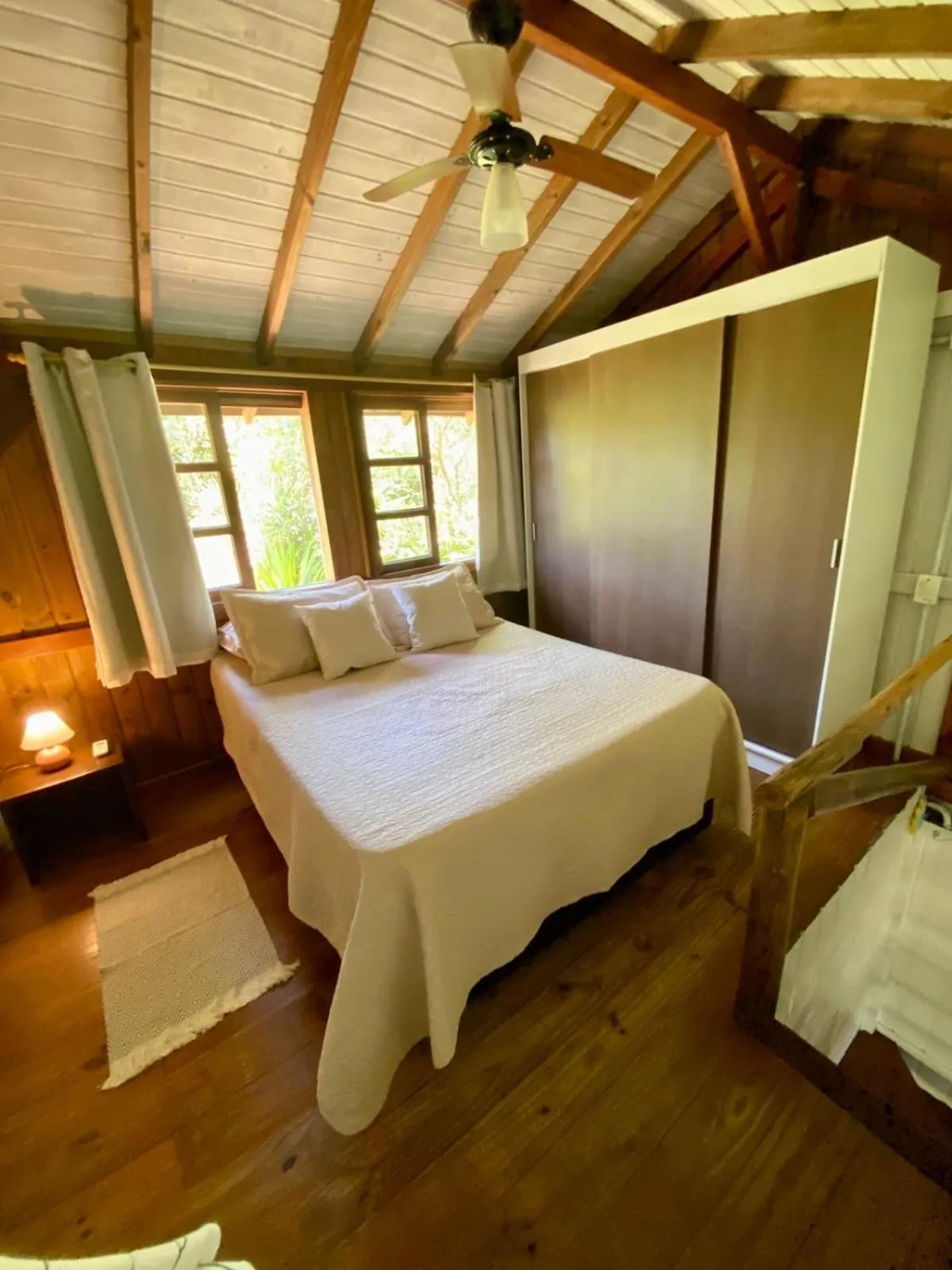 Bed in Recanto das Bromélias Chalés