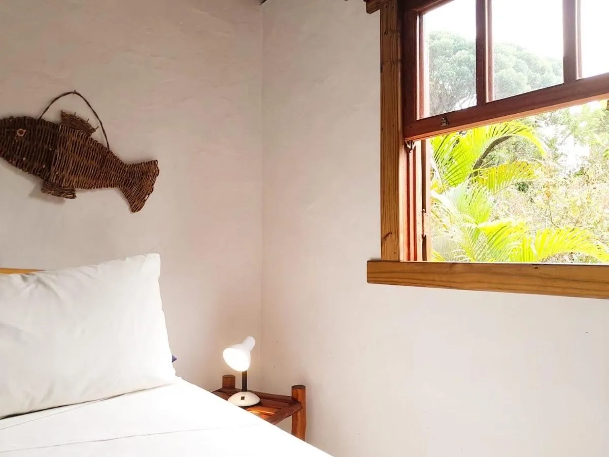 Bed in Recanto das Bromélias Chalés