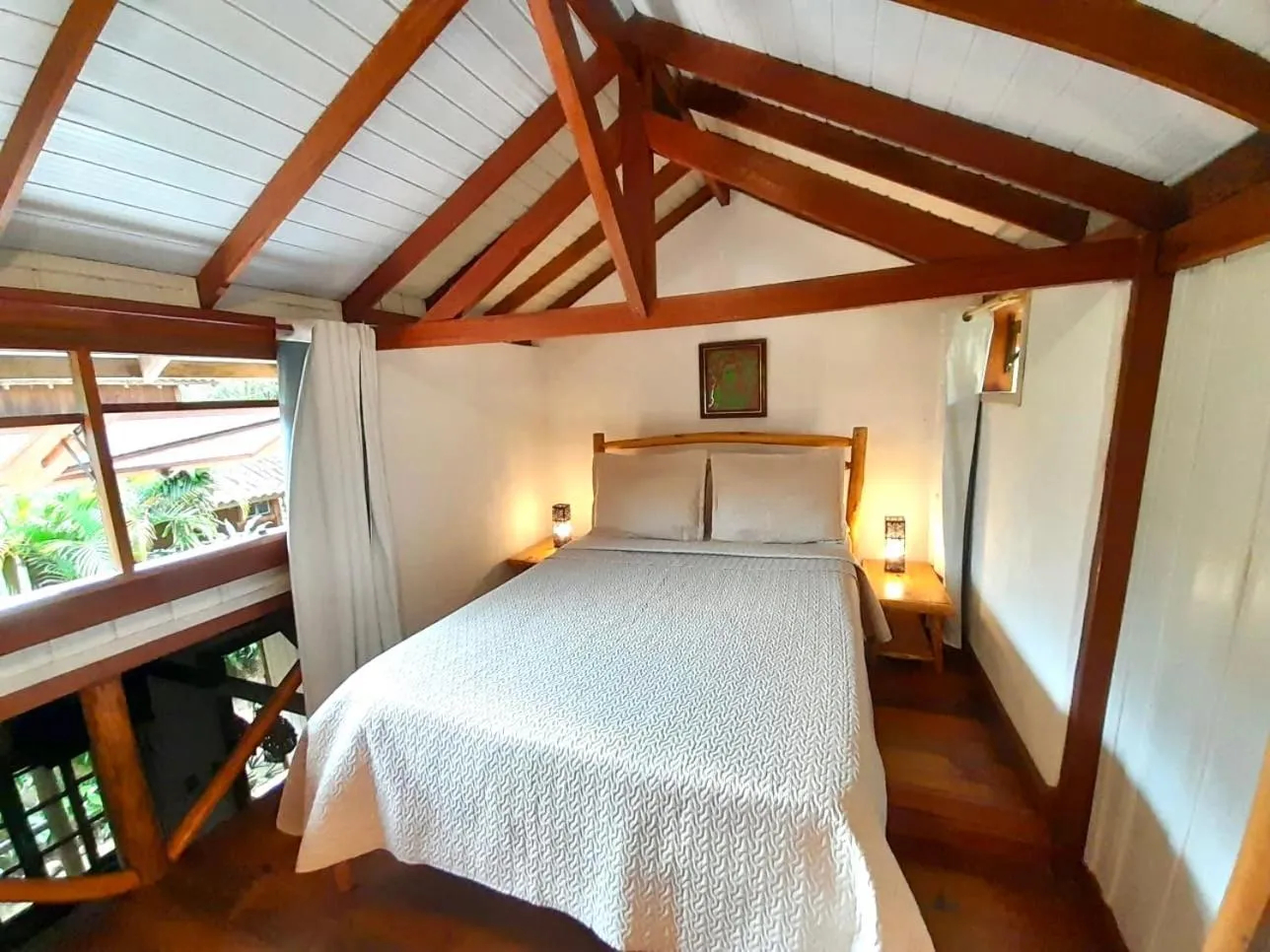 Bed in Recanto das Bromélias Chalés