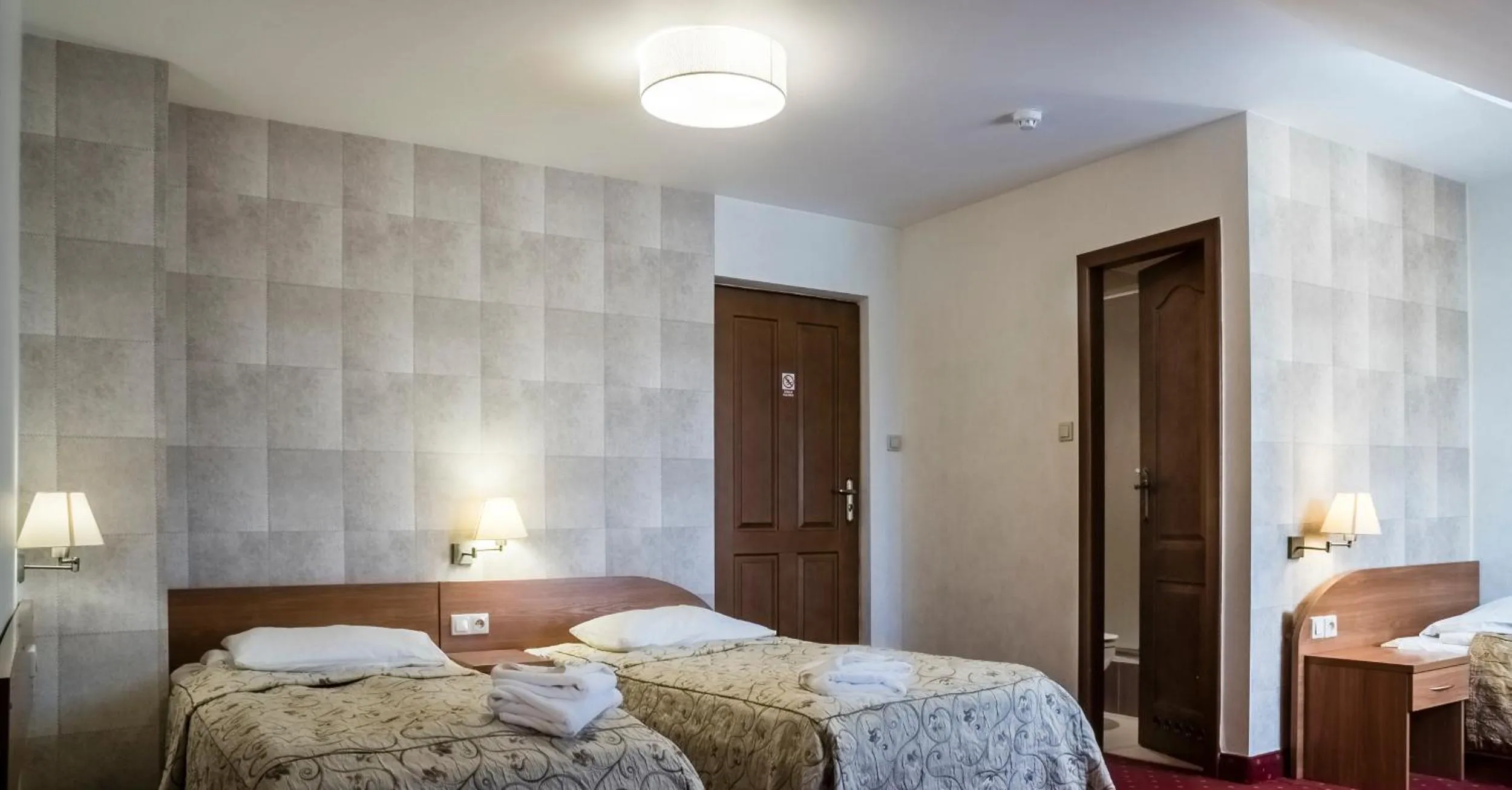 Bed in Hotel Karczówka