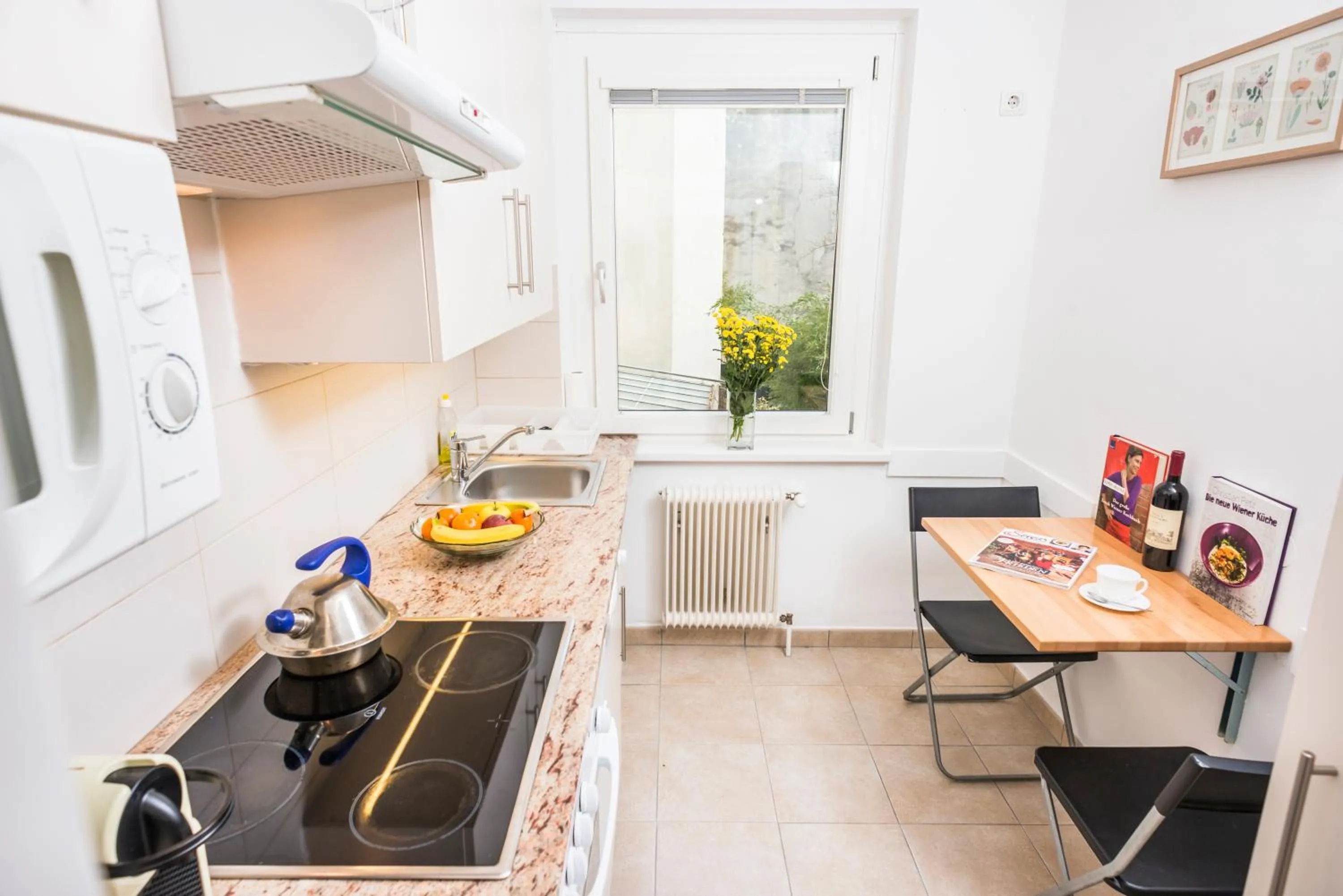 Kitchen or kitchenette in Appartements Ferchergasse