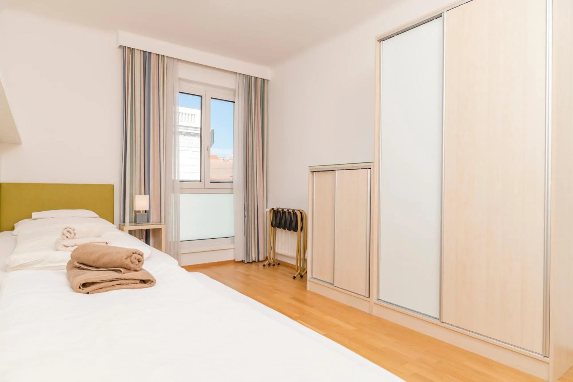 Photo of the whole room, Bed in Appartements Ferchergasse